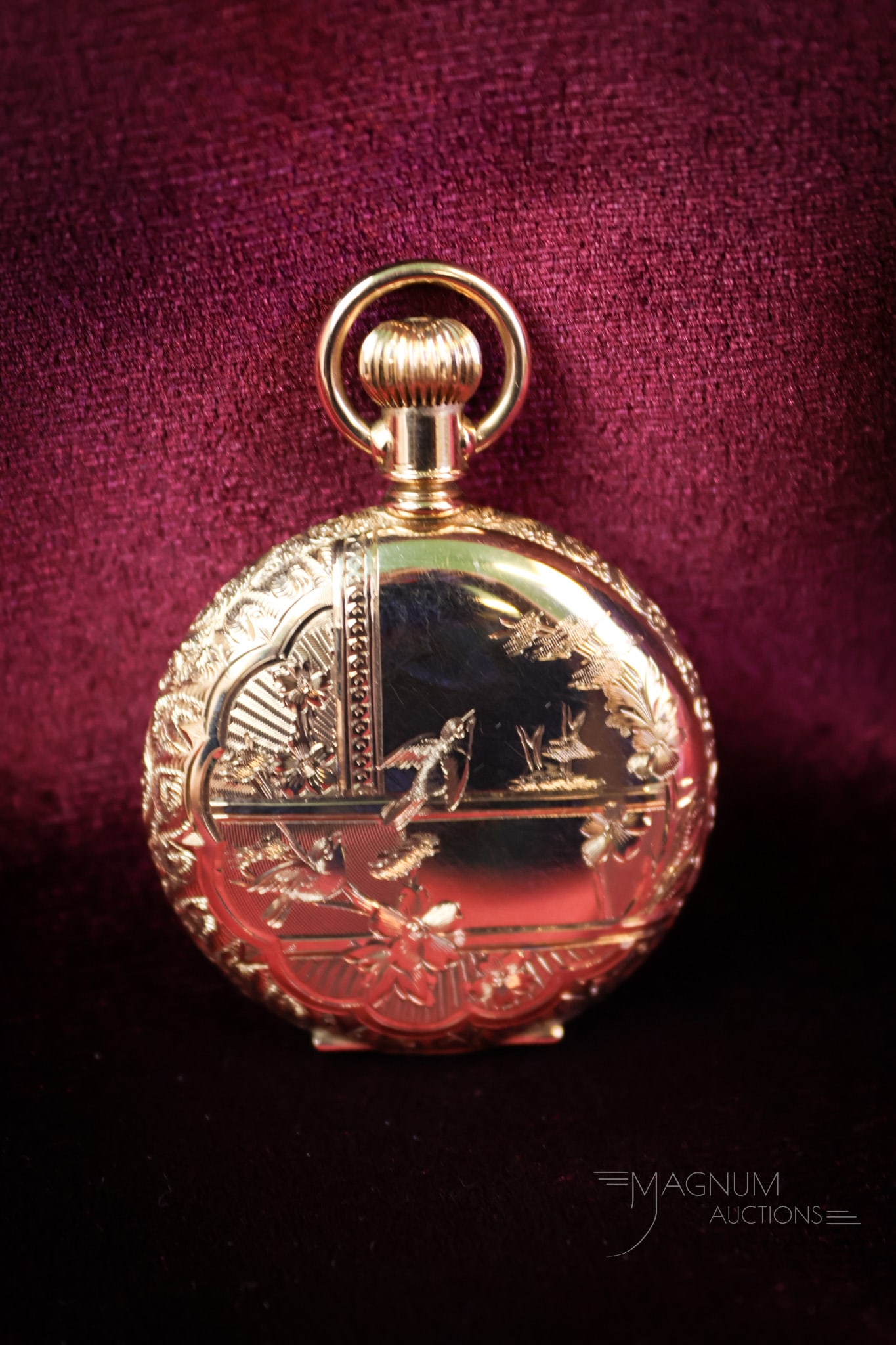 14K Gold Ladies Elgin Hunters case 15 Jewel Pocket Watch 1.155 OZT: A fine 14K Gold Ladies Elgin Hunters Case 15-Jewel Pocket watch. This fine watch is in running condition. The case is engraved with birds on a fence. The weight is 1.155 OZT. SHIPPING NOTICE: If you c