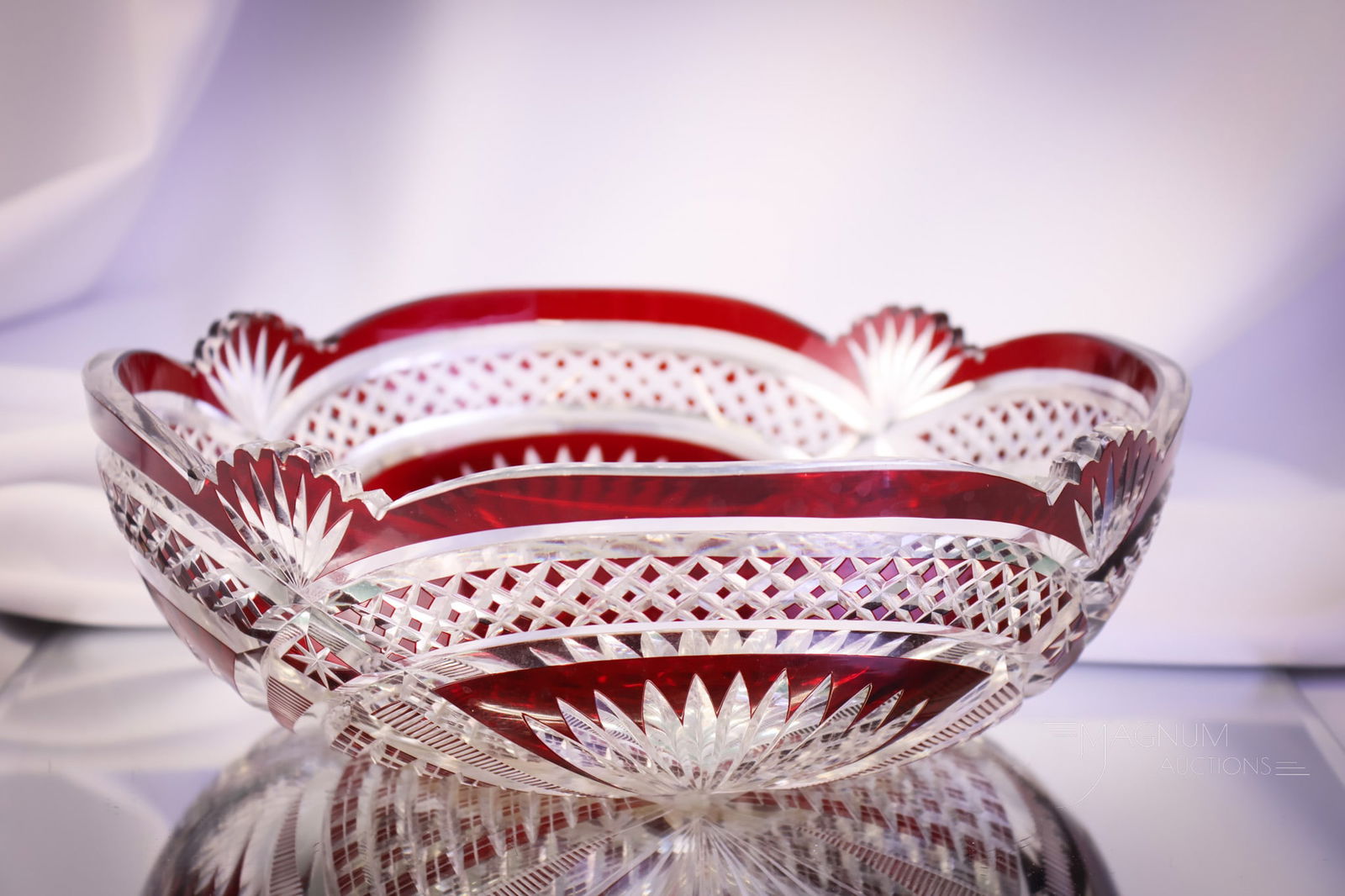 Ruby Cut to Clear Fan & Diamond Cut Glass Bowl: A divine ruby cut to clear bowl featuring a Fan & Diamond pattern. This bowl measures 3" tall and 9 1/2" in diameter. SHIPPING NOTICE: If you choose not to utilize the LiveAuctioneers LiveShip program