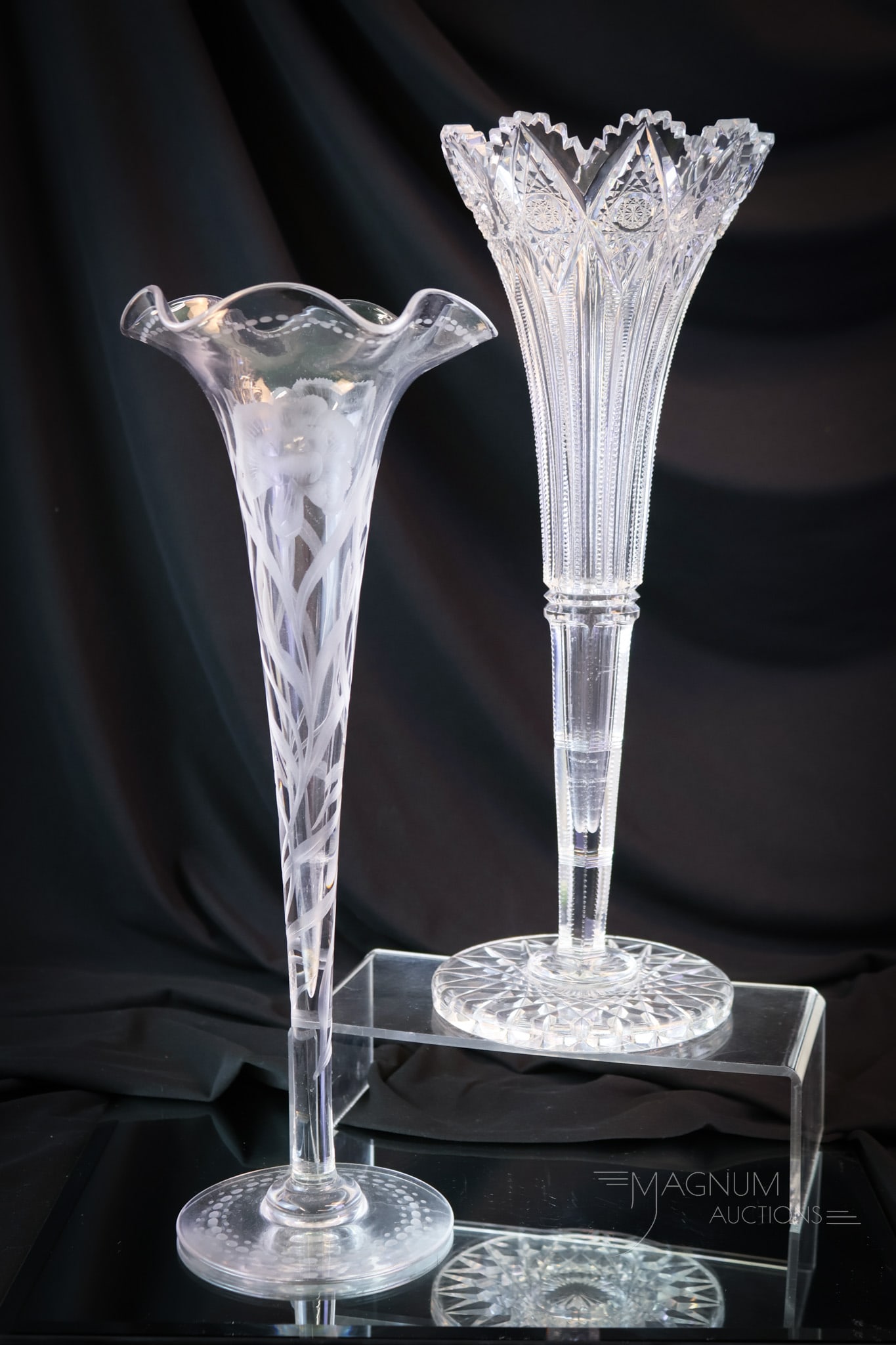 2 pc Lot ABP American Brilliant Period Cut Glass Vases Hawkes & More: Two fine American Brilliant Period cut glass vases. The first is a signed Hawkes example in the Brunswick pattern. The second is a gravic cut pansy lily vase. The tallest measures 13". SHIPPING NOTICE