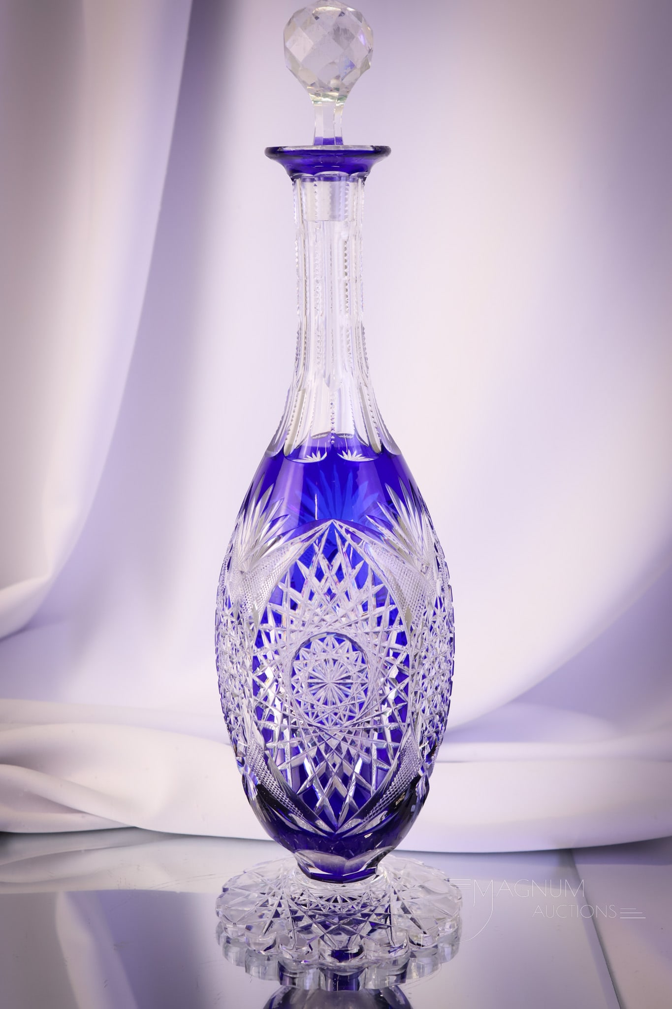 Val St. Lambert Cobalt Cut to Clear Glass Decanter: A beautiful Val St. Lambert cobalt cut to clear pattern #HF347 decanter. This piece is circa 1908. The decanter measures 16 1/4" tall. The stopper is a replacement as the original would have been coba