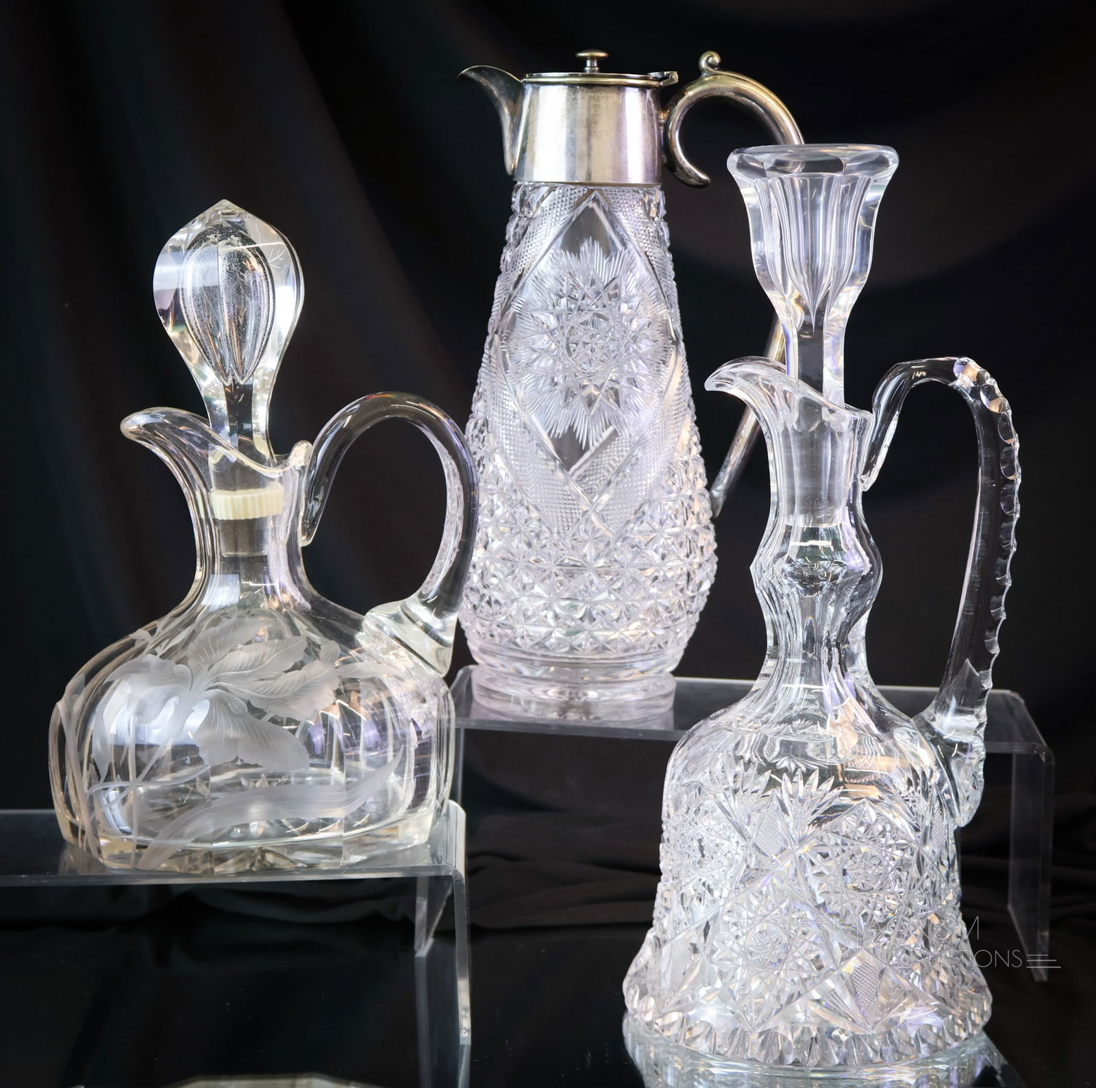 3 pc Lot Crystal Decanters American Brilliant Period Cut Glass Moser & More: Three unique selections in a crystal glass decanter. The first is an American brilliant Period cut decanter with Hobstar cutting. The second is a Moser Intaglio with Iris flowers. The third is a Europ