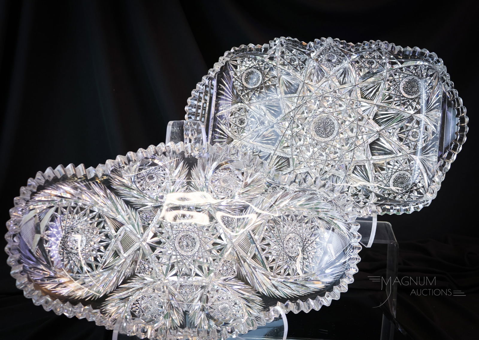 2 pc Lot American Brilliant Period Cut Glass Ice Cream Trays: Two gorgeous examples of American Brilliant Period cut glass ice cream trays. The first is signed Fry example oval with a wreathed Hobstar cutting. The second is a ractangular example with a Hobstar &