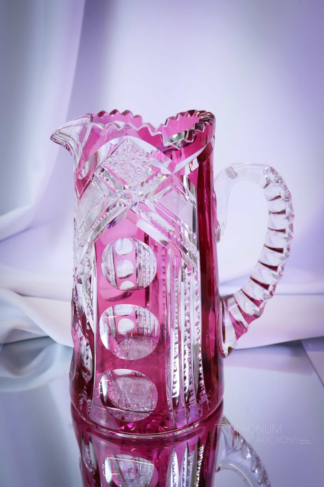 ABP American Brilliant Period Cranberry Cut to Clear Water Pitcher: A gorgeous find in American Brilliant Period cranberry cut-to-clear glass. This pitcher is attributed to Mt. Washington. The pitcher has extraordinary coloring. The pitcher measures 9 1/4" tall. SHIPP