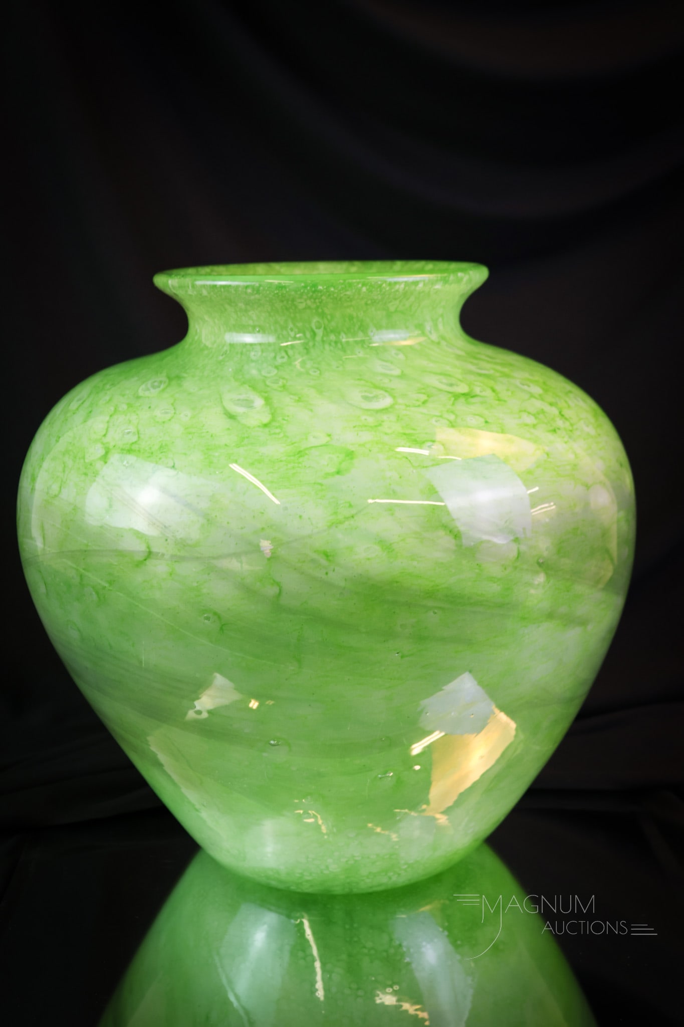 Monumental Steuben Cluthra "F. Carder" Art Glass Vase: A monumental find in Steuben art glass. This is a green Cluthra glass vase. This fine example measures 12" tall and 12" wide.. The vase is signed "Steuben & F. Carder." SHIPPING NOTICE: If you