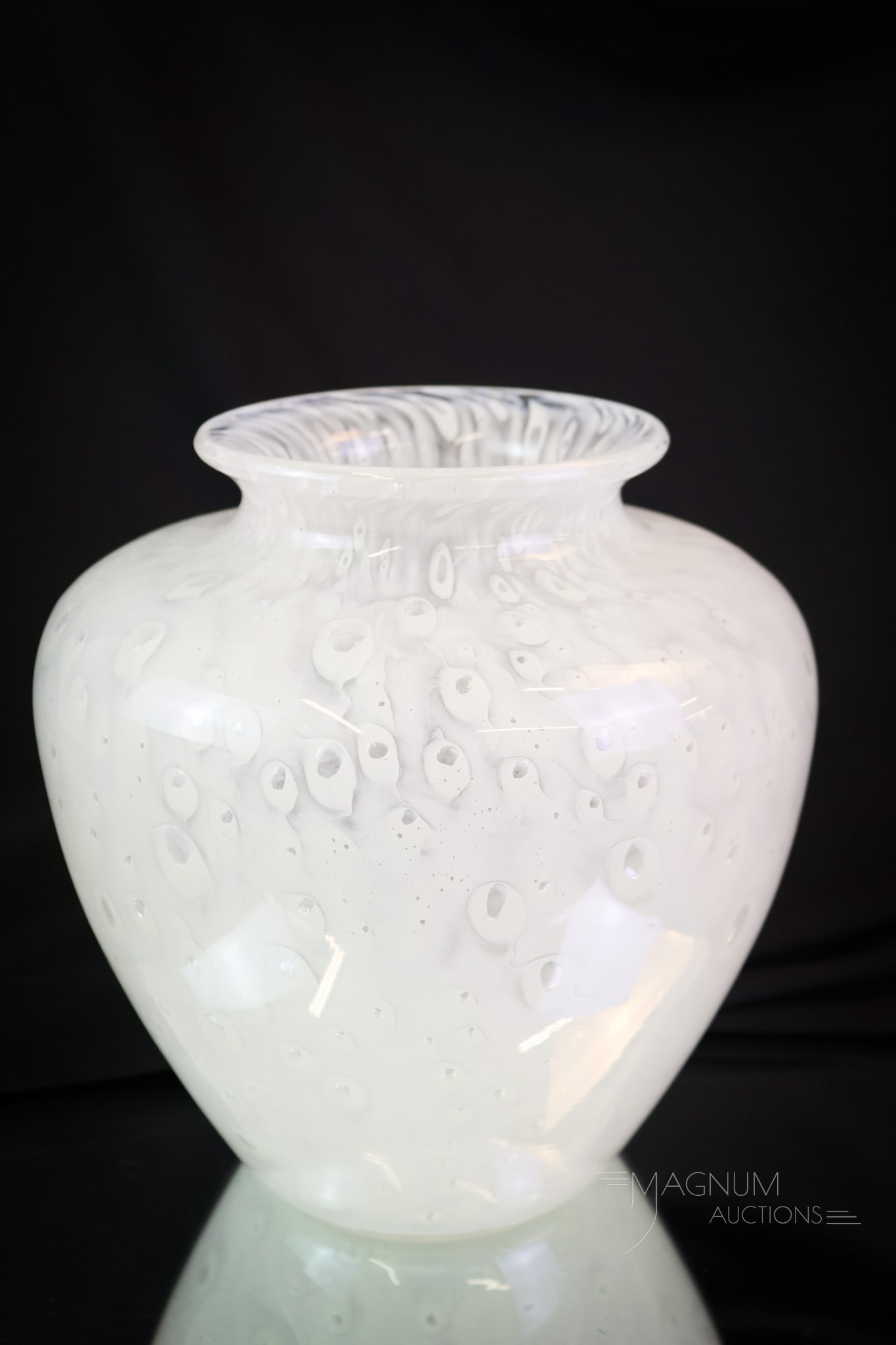 Steuben White Cluthra Classic Form Art Glass Vase: A classic form for Steuben. This is a white Cluthra vase. This great example measures 8" tall and 7 1/2" wide. SHIPPING NOTICE: If you choose not to utilize the LiveAuctioneers LiveShip program, MAGNU