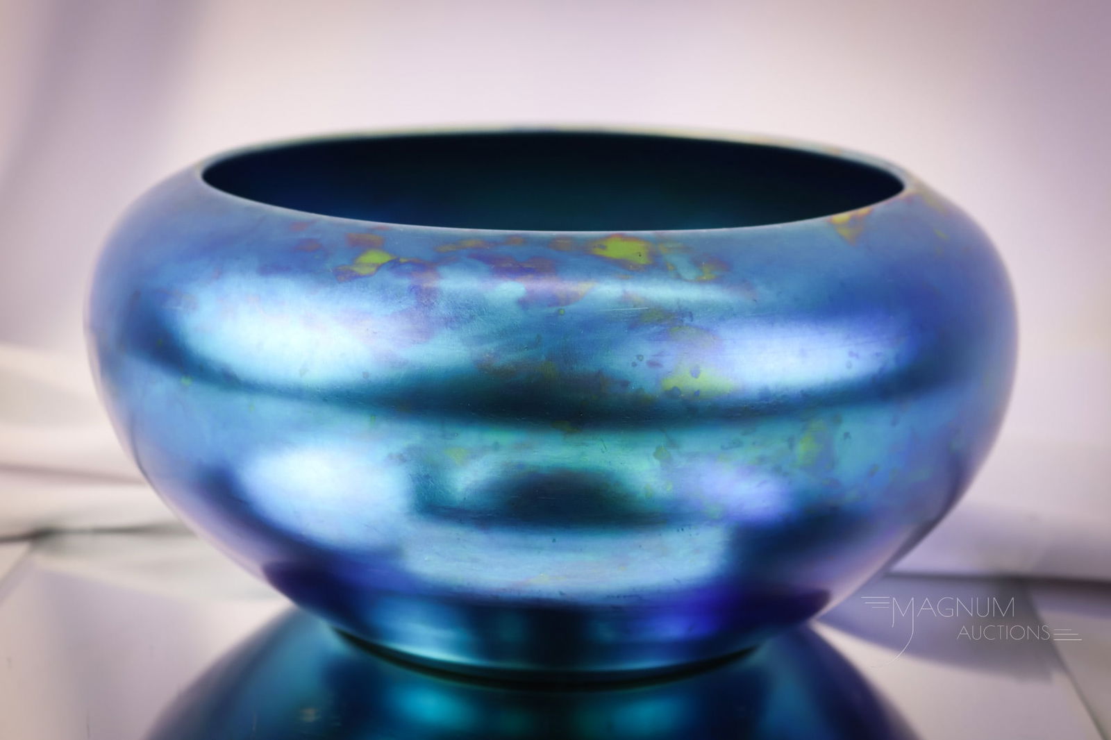 Steuben Blue Aurene Art Glass #2687 Bowl: A gorgeous Steuben blue Aurene art glass bowl. This piece is marked "Steben Aurene #2687." The bowl has great iridescence. The piece measures 4 3/4" tall. SHIPPING NOTICE: If you choose not to utilize