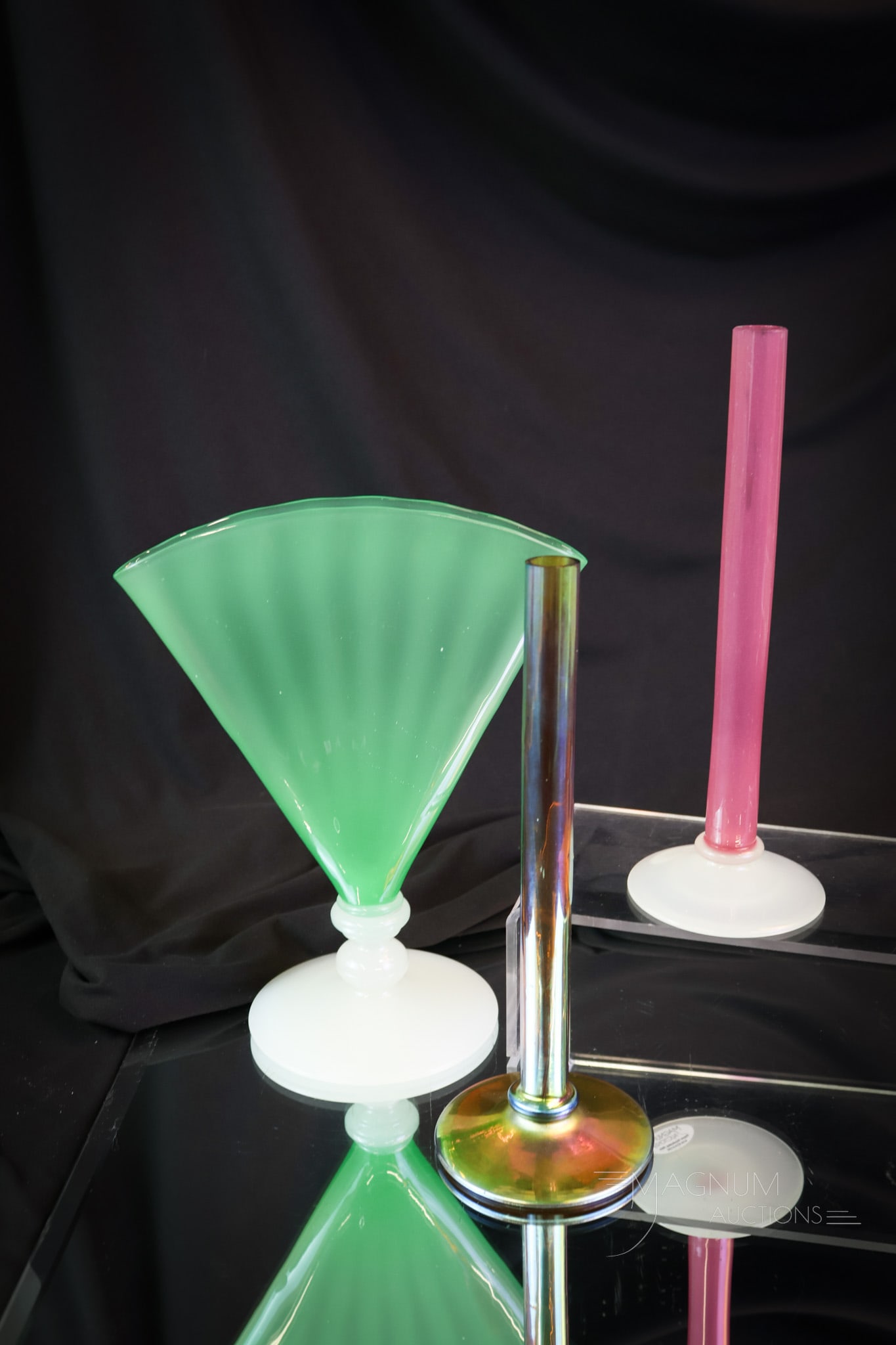 3 pc Lot Steuben Art Glass Aurene Rosalene & Jade: Three unique pieces of Steuben art glass. This lot includes a gold aurene stick vase. A Rosalene & Alabaster stick vase. Lastly, there is a Jade & Alabaster fan vase. The fan vase is rich in uranium