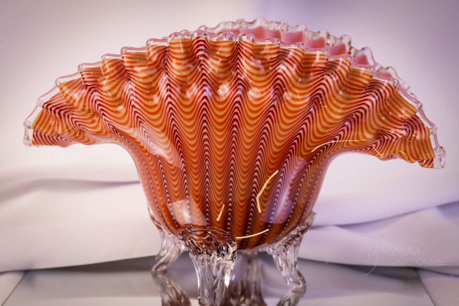 Stevens & Williams Northwood Pull-Up Osiris Art Glass Bowl: Another beautiful example of Stevens & Williams Northwood art glass in the Pull-Up or Osiris line. This is a four-footed large bowl. This bowl features a burgundy interior and lovely colors on the ext