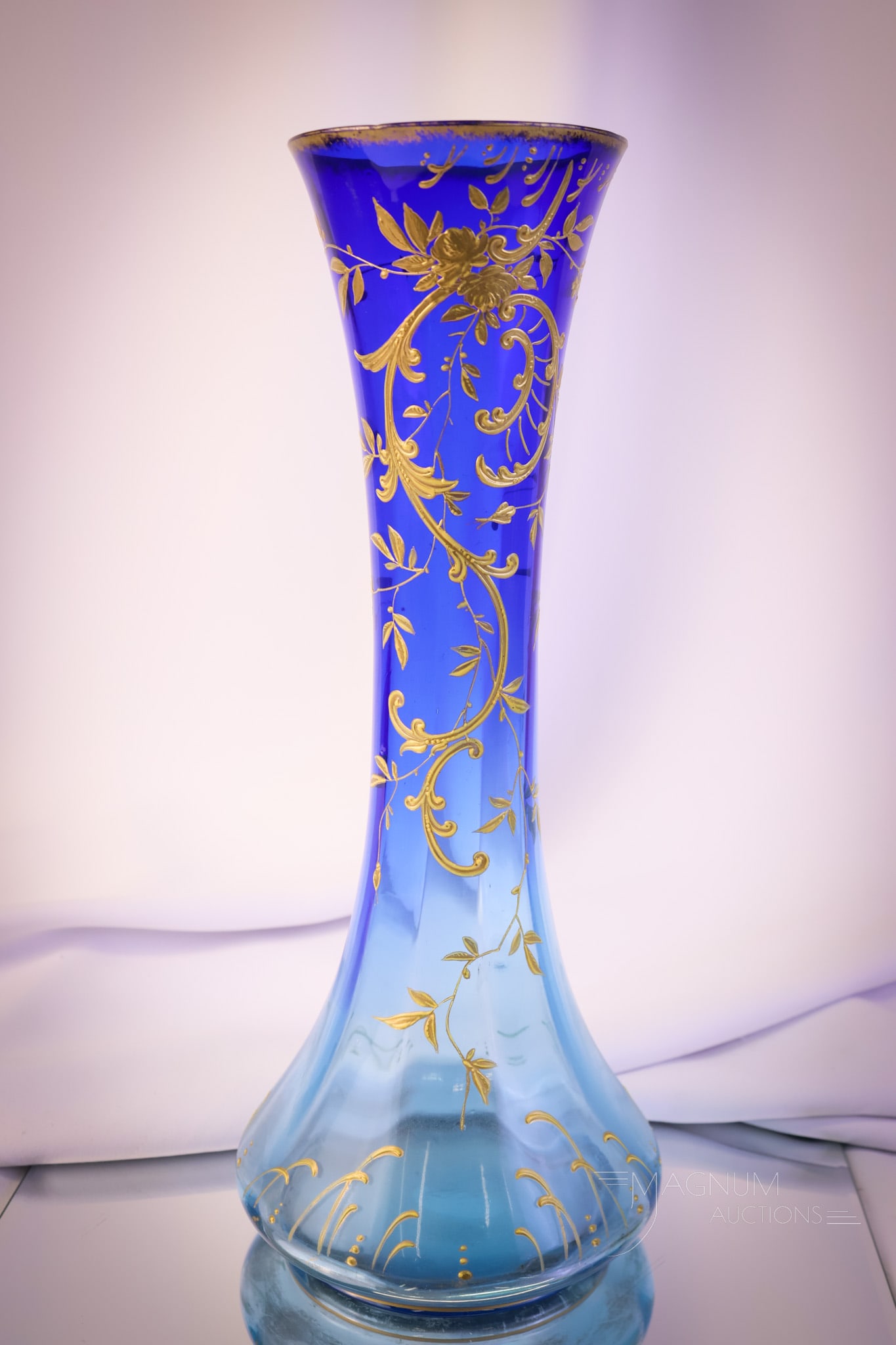 14" Victorian Ombre Blue Gilt Enameled Art Glass Vase: Here's a find for your art glass collection! This is a massive 14" tall Victorian glass vase. It is in an ombre blue coloring fading from indigo to a light azure blue. It is gilt and enamel decorated.
