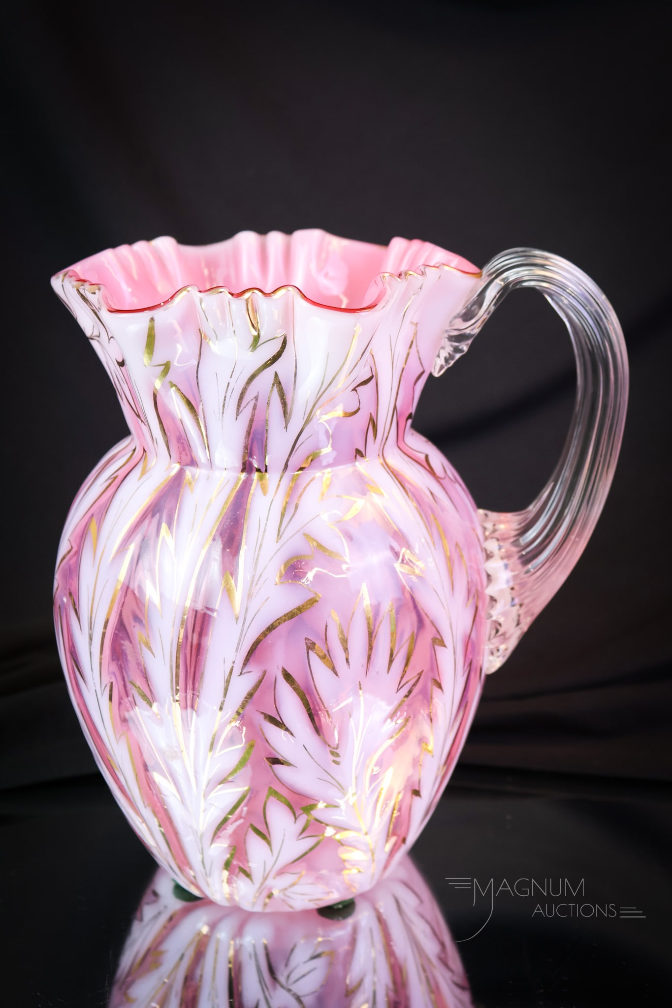Rare Cranberry Opalescent Victorian Gilt Scottish Moor Water Pitcher: A rare and wonderful find in a Victorian opalescent glass water pitcher. This pitcher is in the Scottish Moor pattern. This supreme example has rich cranberry coloring and striking opalescence. The Sc