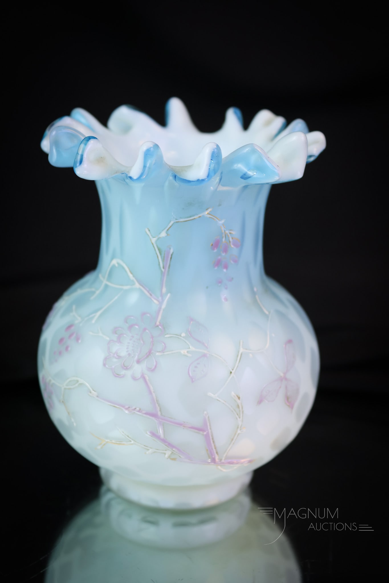 Victorian Uranium Mother of Pearl Art Glass Enameled Vase: A beautiful little find in a piece of uranium-rich Victorian mother-of-pearl glass. This vase features a cut-fingered top rim and delicate enameled decoration. This little vase measures 4 1/4" tall. S