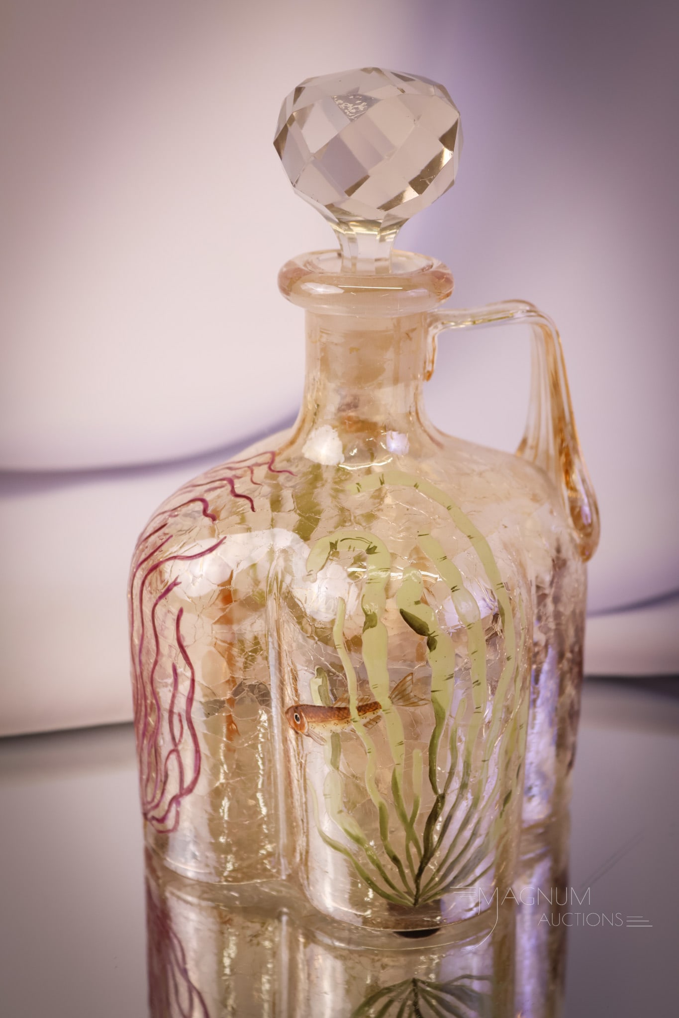 Moser Bohemian Craquelle Glass Fish Pond Claret Art Glass Decanter: A gorgeous and rare find in an art glass claret decanter. This piece is attributed to Moser or another Bohemian maker. This "Fish Pond" decanter is in craquelle glass with a marigold flash. It is deco