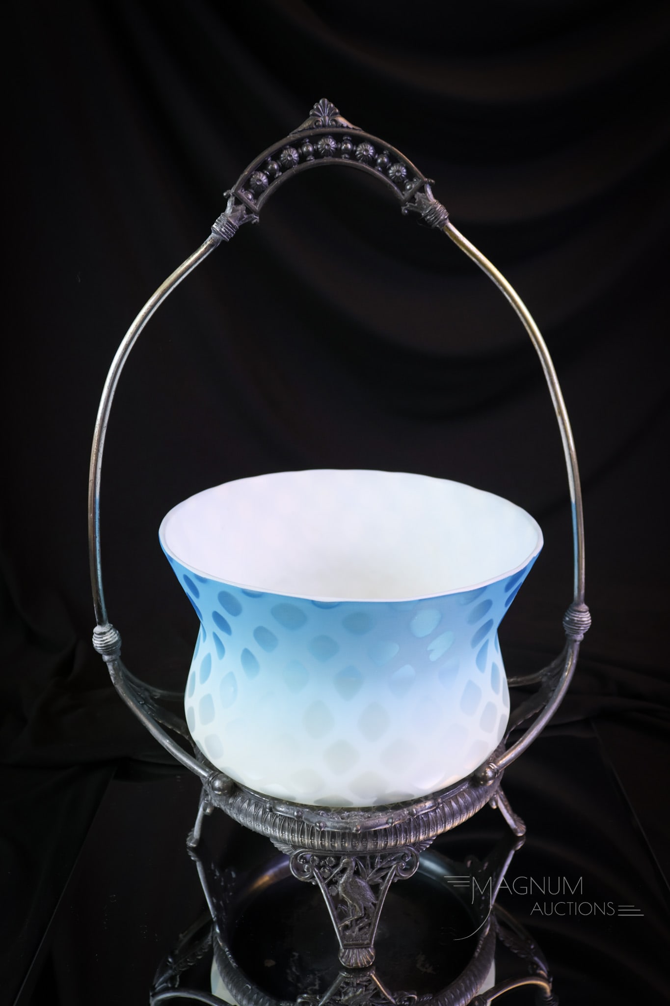 Tufts Silverplate Victorian Blue Mother of Pearl Satin Glass Brides Bowl Basket: A beautiful, signed Tufts Victorian silverplate brides basket, complete with a blue satin diamond-quilt mother of pearl bowl. This fine example measures 14 1/2" tall and 9 1/4" wide. SHIPPING NOTICE: