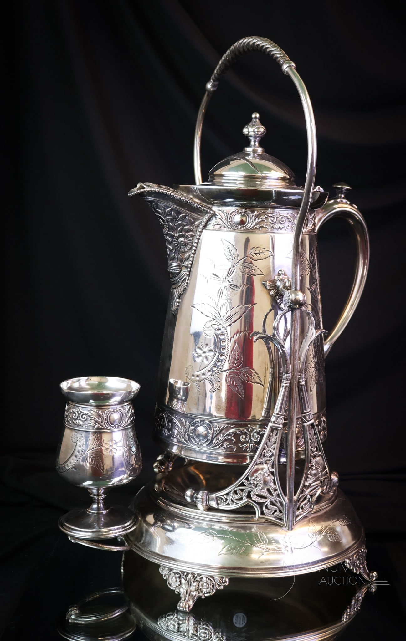 Meriden Silverplate Victorian Water Tipler: Another find in our auction of Victoriana. This is a signed Meriden silverplate tipler. This bad boy measures an astounding 19" tall. A wonderful piece for your collection. SHIPPING NOTICE: If you