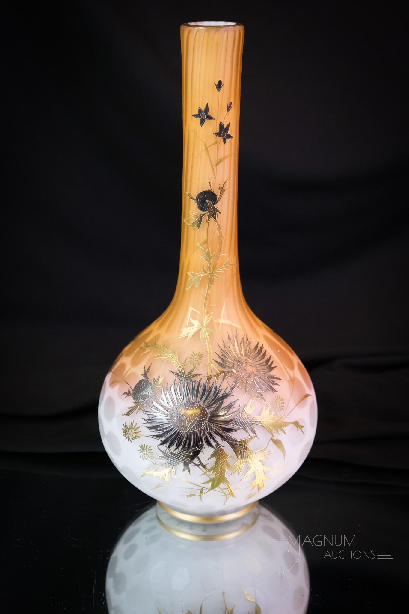 Victorian Raindrop Mother of Pearl Satin Glass Gilt Decorated Stick Vase: A great find in our lineup of Victorian art glass. This is a stick vase in a Raindrop pattern mother of pearl satin glass. This glass has a die-away coloration of intense tangerine color. The vase is
