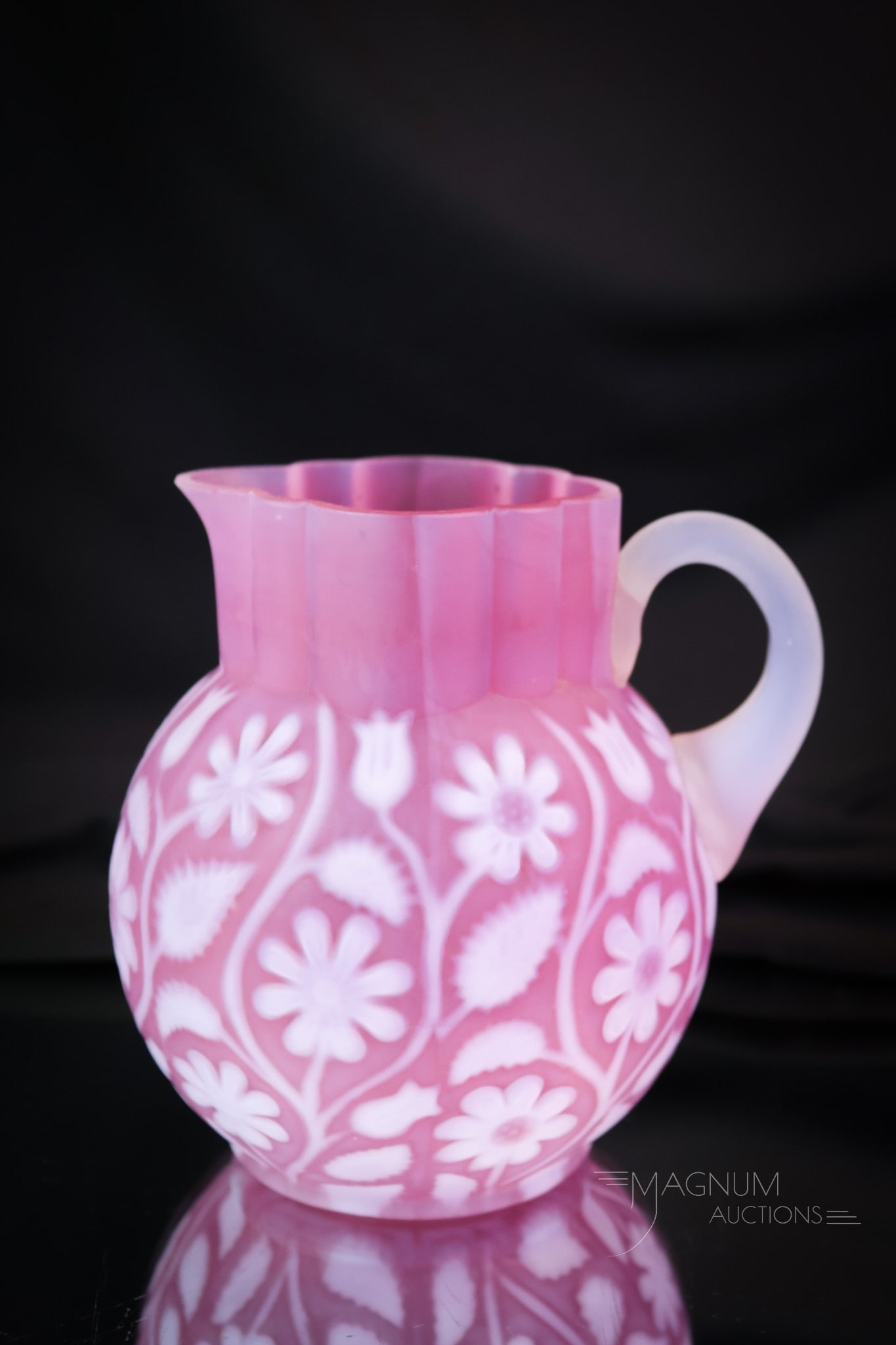 Victorian Findlay Glass Floradine Cranberry Opalescent Cream Pitcher: A wonderful example of a piece of Victorian Findlay Floradine glass. This is a creamer. It has a delightful color and opal flower pattern. This creamer measures 4 1/2" tall and 4" wide. A