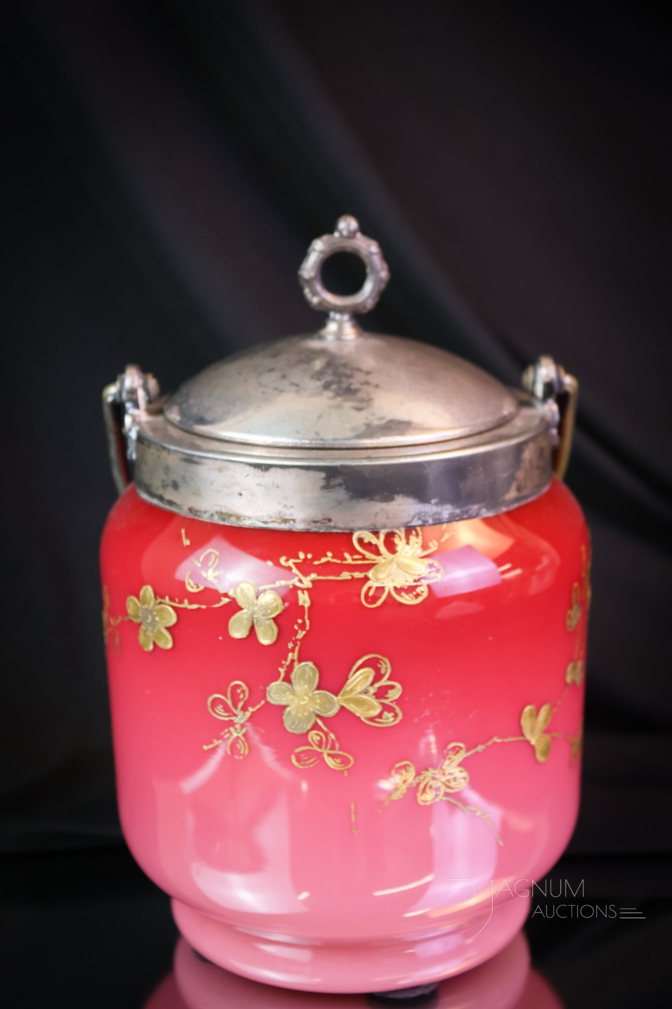 Webb Peachblow Uranium Gilt Decorated Victorian Art Glass Biscuit Jar: A divine Webb peachblow uranium-rich glass Victorian biscuit jar. This fine example of art glass glows brightly under black light. It is decorated with gold florals. The biscuit jar retains its origin