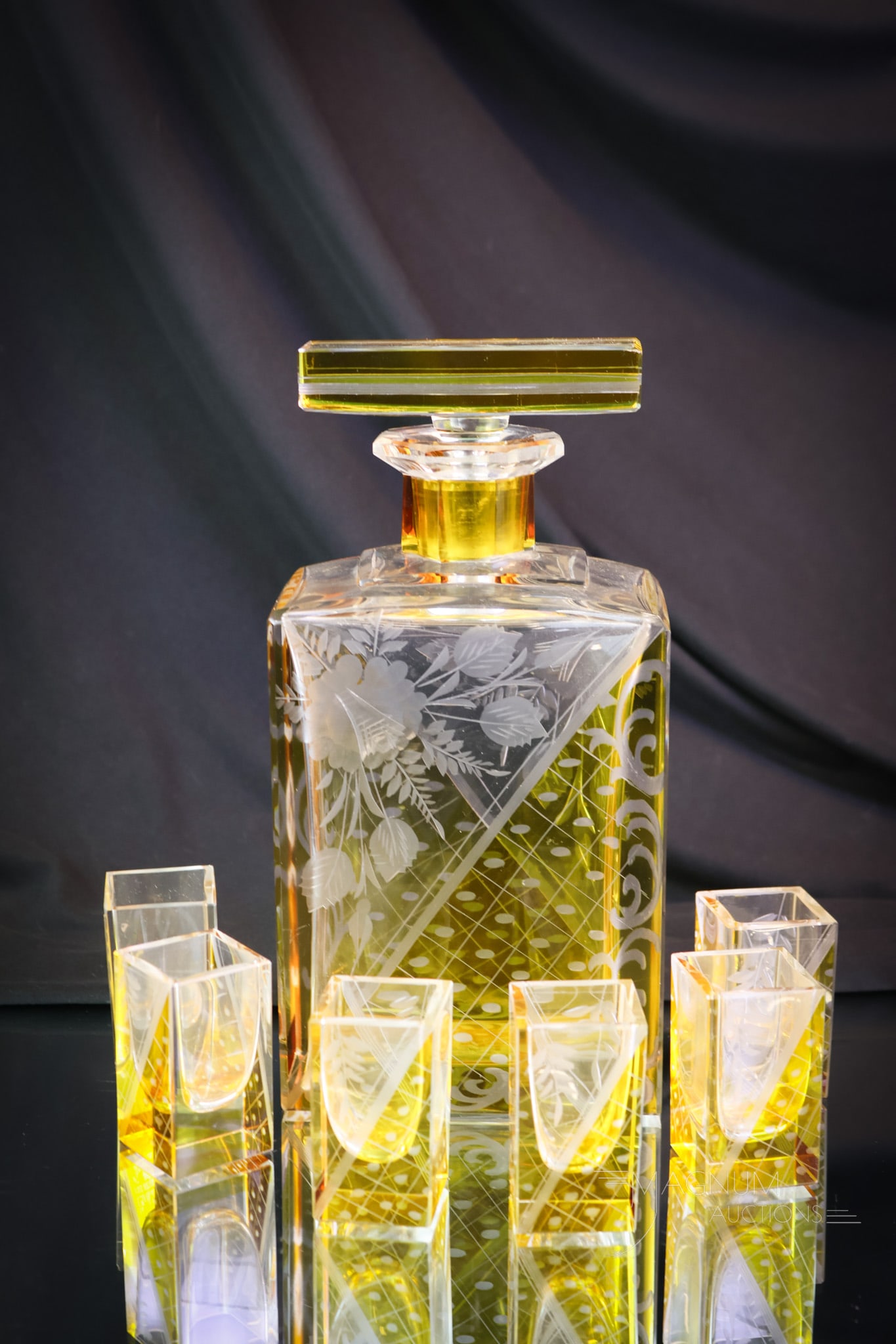 7 pc Czech Art Deco Engraved Glass Decanter Set: A nice find in an Art Deco-style engraved Czech glass decanter set. This set features amber-stained engraved glass in a square form. The set includes a decanter and six glasses. SHIPPING NOTICE: If yo