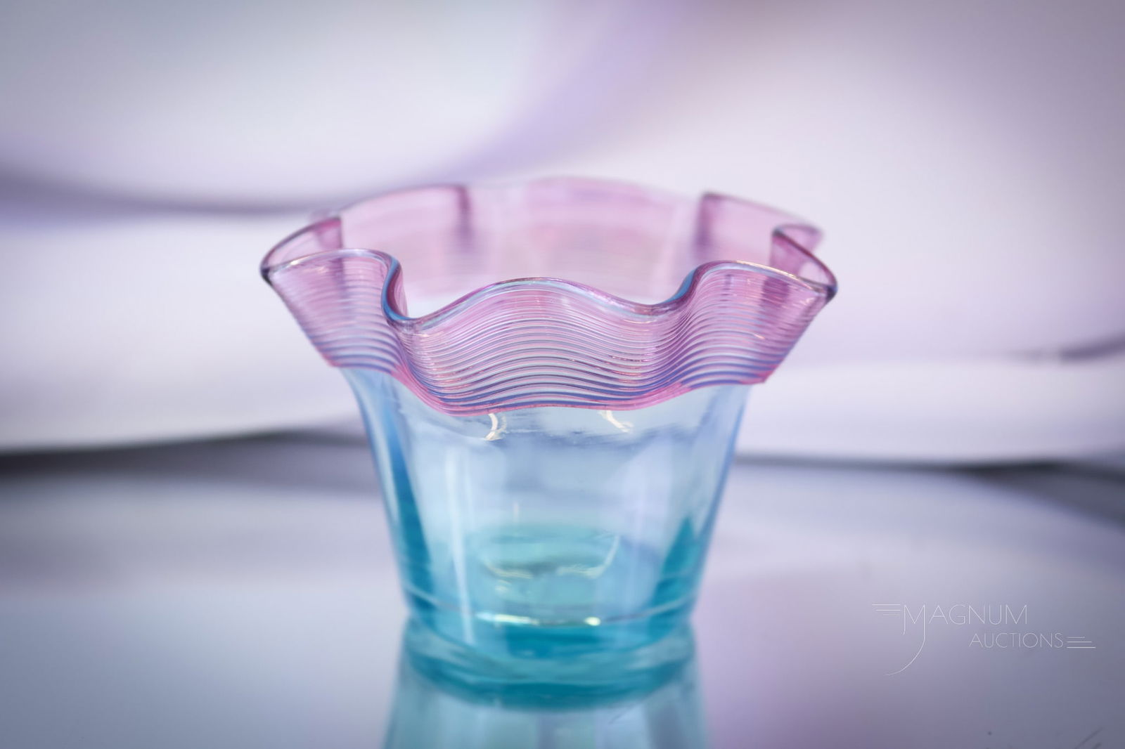 Rare Blue Opalescent Threaded Art Glass Victorian Toothpick Holder: A rare find in a Victorian art glass toothpick holder. This is a blue opalescent glass example with pink threading. This little cutie measures 2" tall. SHIPPING NOTICE: If you choose not to utilize