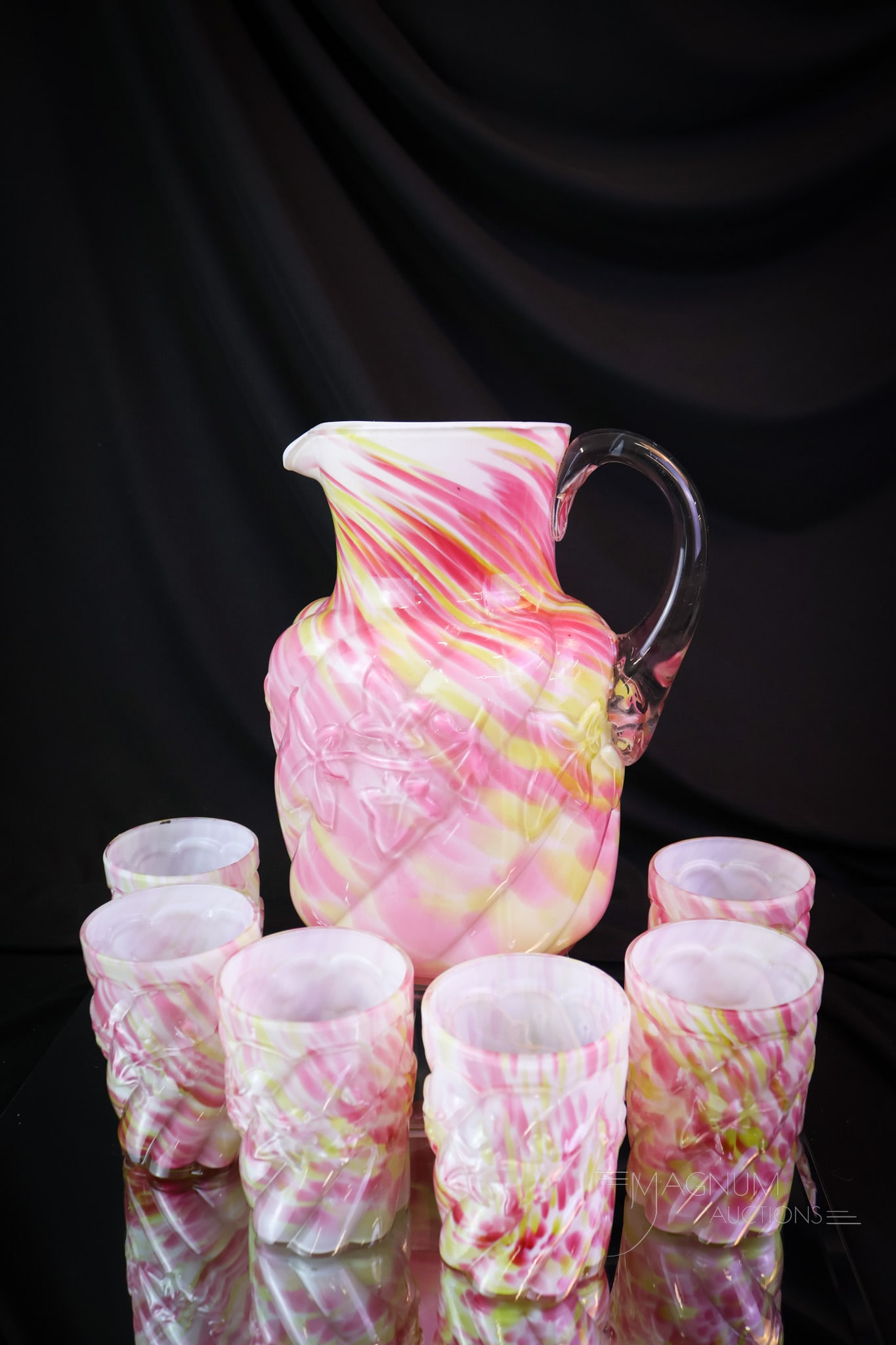 7 pc Northwood Royal Ivy Cased Spatter Victorian Glass Water Set: A beautiful offering of a Northwood cased rainbow spatter Royal Ivy pattern water set. This set includes a pitcher and six tumblers. The tallest measures 8 1/2". SHIPPING NOTICE: If you choose not to