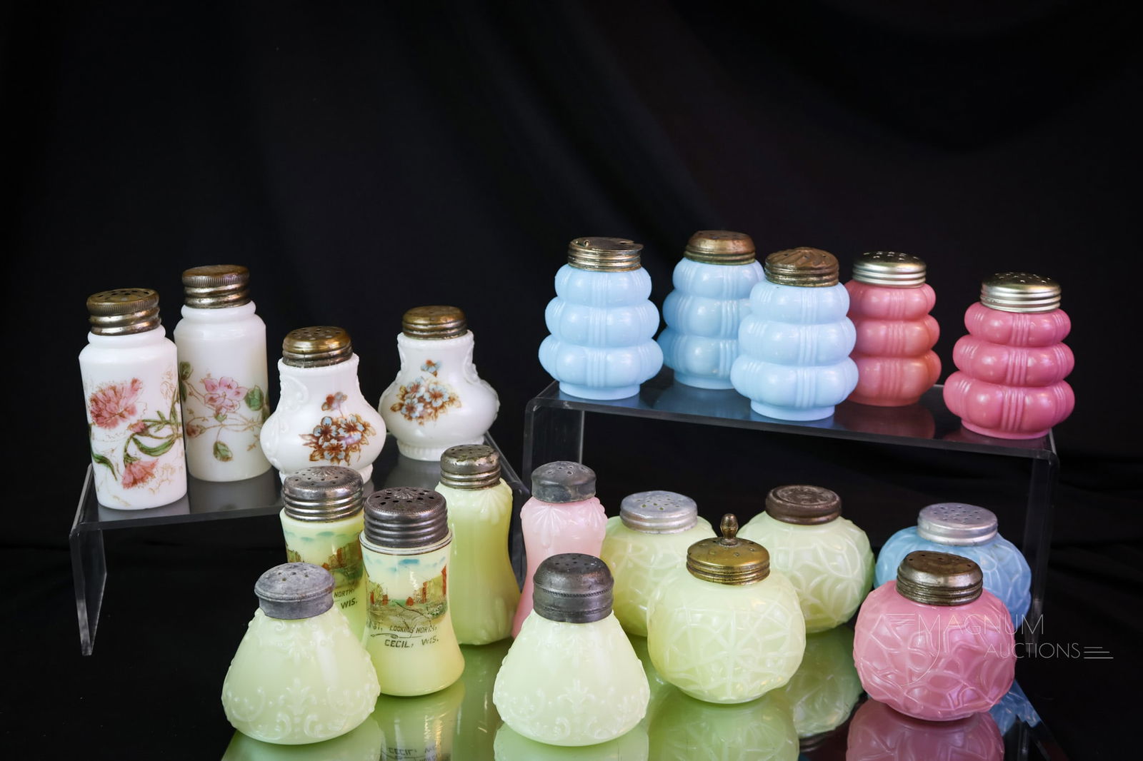 20 pc Lot Victorian Glass Salt Shakers Pink Blue Uranium-Custard: Twenty collectible Victorian salt shakers are found in this lot. You'll want to take another look at all of these lovelies. This lot includes examples in pink opaque, blue milk glass, and uranium-rich