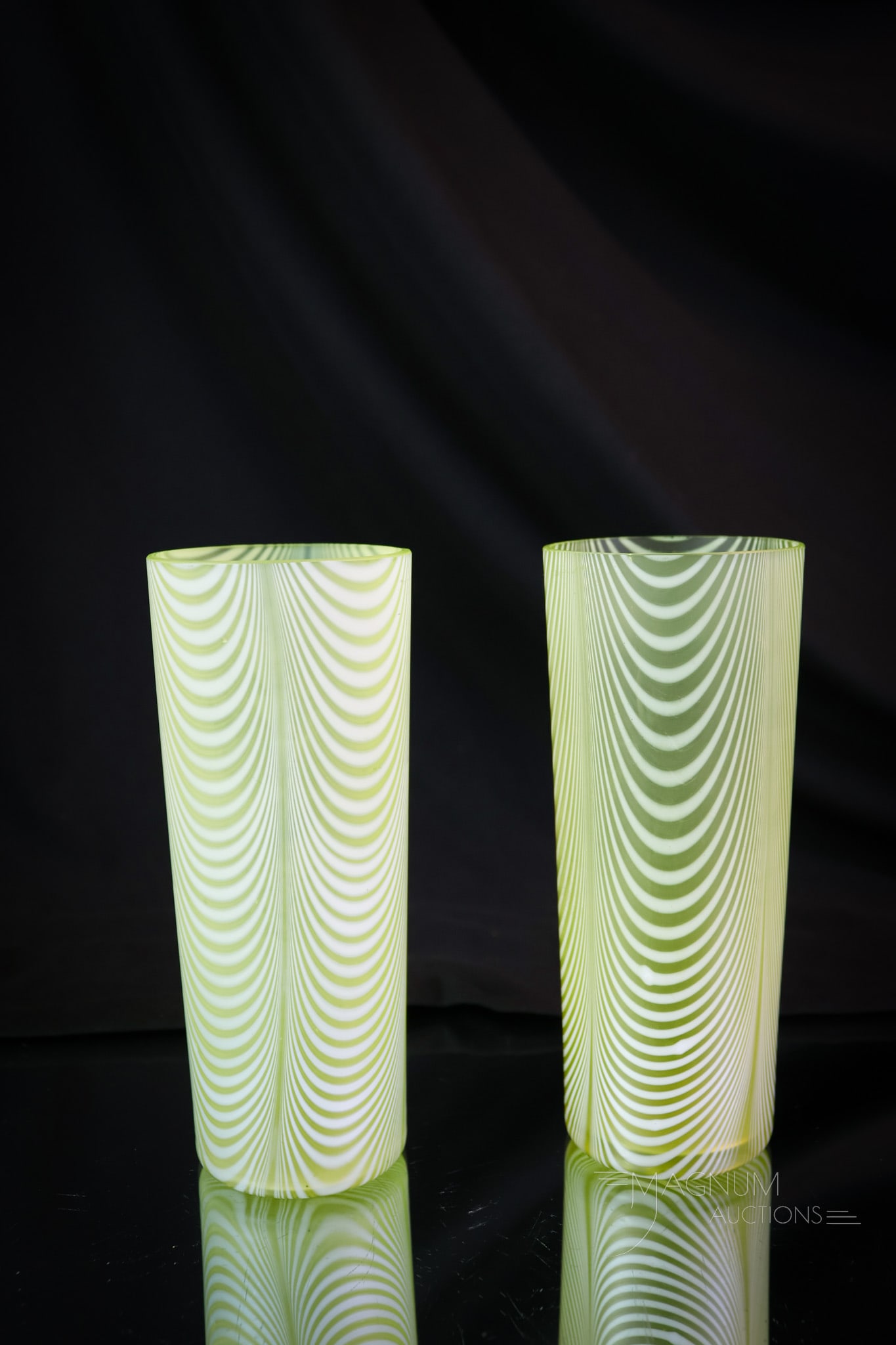 2 pc Lot Rare Phoenix Vaseline Nailsea Glass Lemonade Tumblers: A rare find in Phoenix Victorian vaseline satin Nailsea glass. This lot offers two lemonade tumblers that are seldom ever found. We sold the tankard pitcher several auctions ago. These measure 5 1/2"