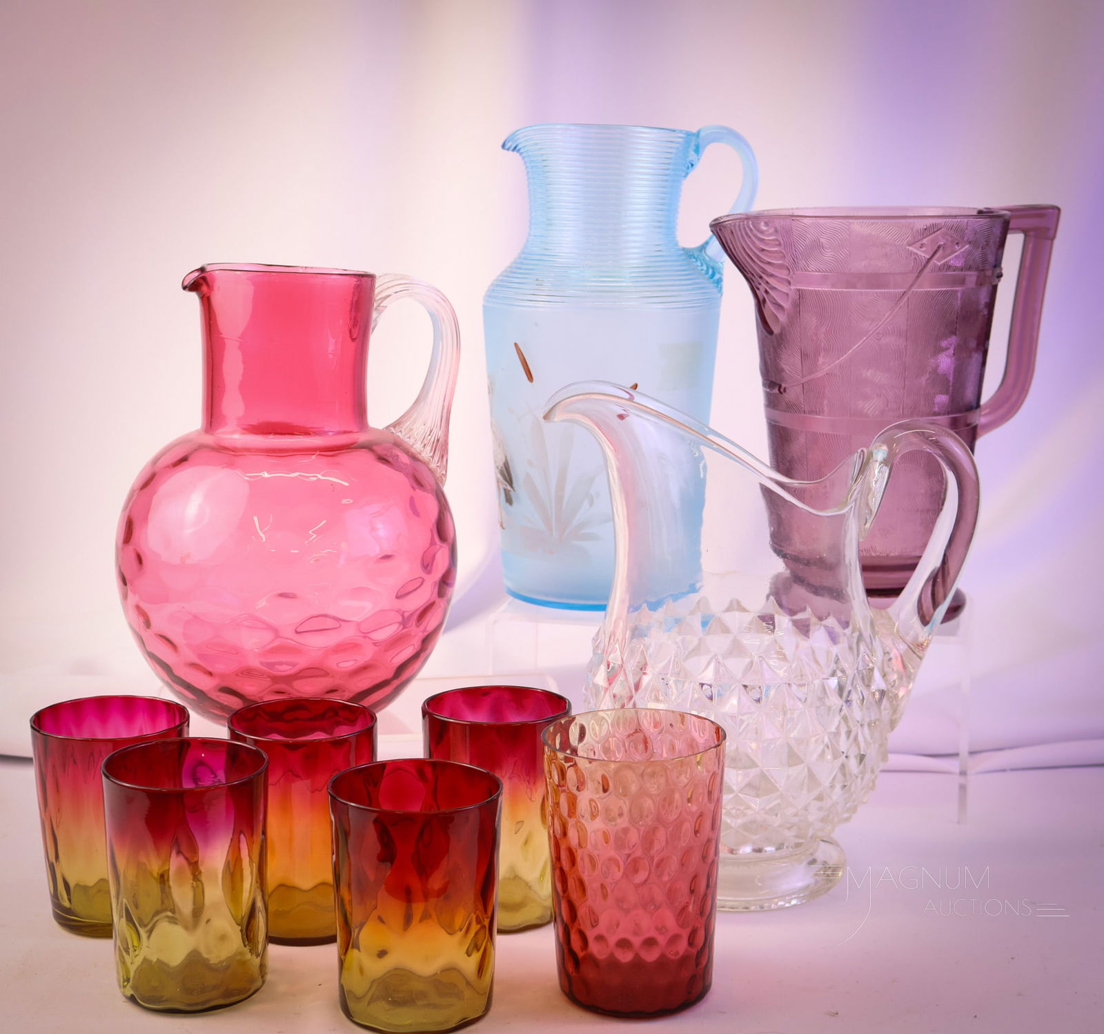10 pc Lot Victorian Pattern & Art Glass Mt. Washington & More: Ten sure-fire delights for your bidding pleasure make up this generous lot. This lot includes four water pitchers and a set of six Mt. Washington amberina diamond-quilt tumblers. The tallest measures