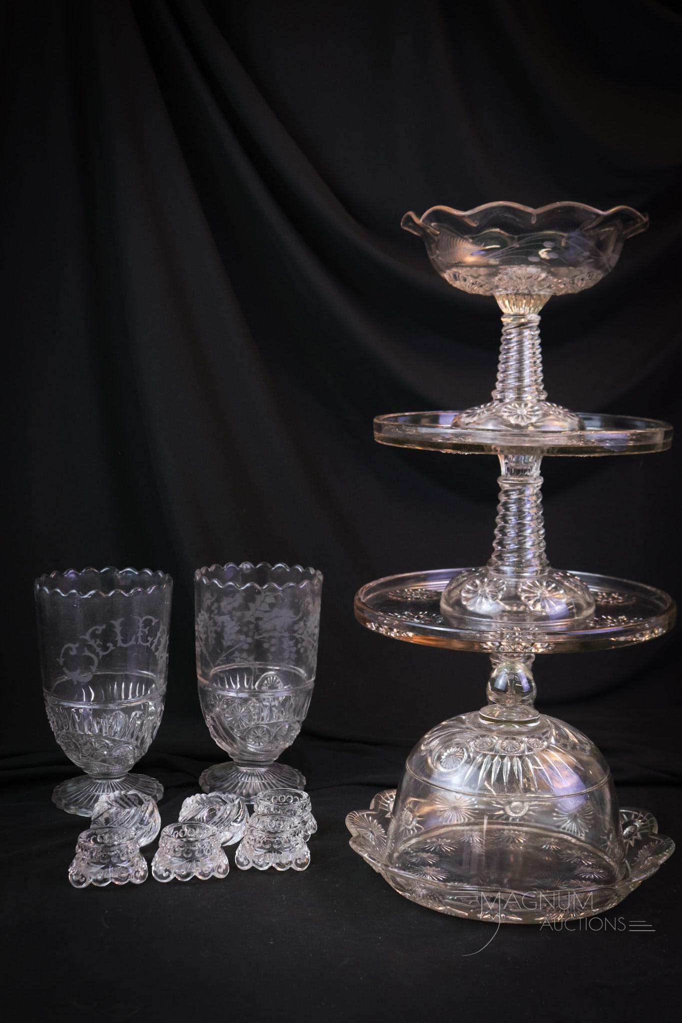 12 pc Lot Riverside Collectible Victorian Glass: A dozen desirable finds for your collection. This lot offers two pieces of the Roman Rosette cake plates and a compote. There is also two Esther celery vases and a cheese. Lastly, there are six open s