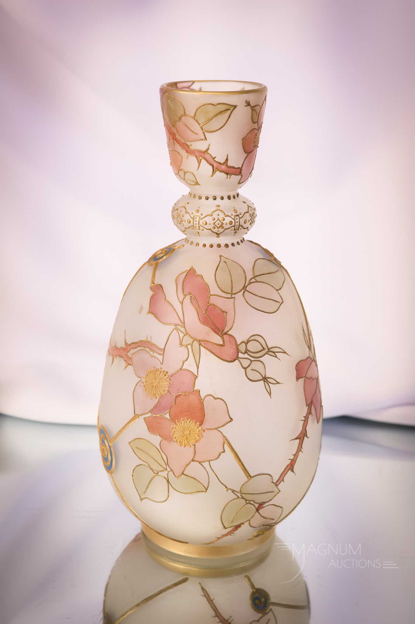 Mt. Washington Royal Flemish Victorian Art Glass Vase: A beautiful example of a rare piece of art glass by Mt. Washington. This example measures 9 1/2" tall and 4 1/4" wide. This piece is decorated with florals and segmented panels. SHIPPING NOTICE: If yo