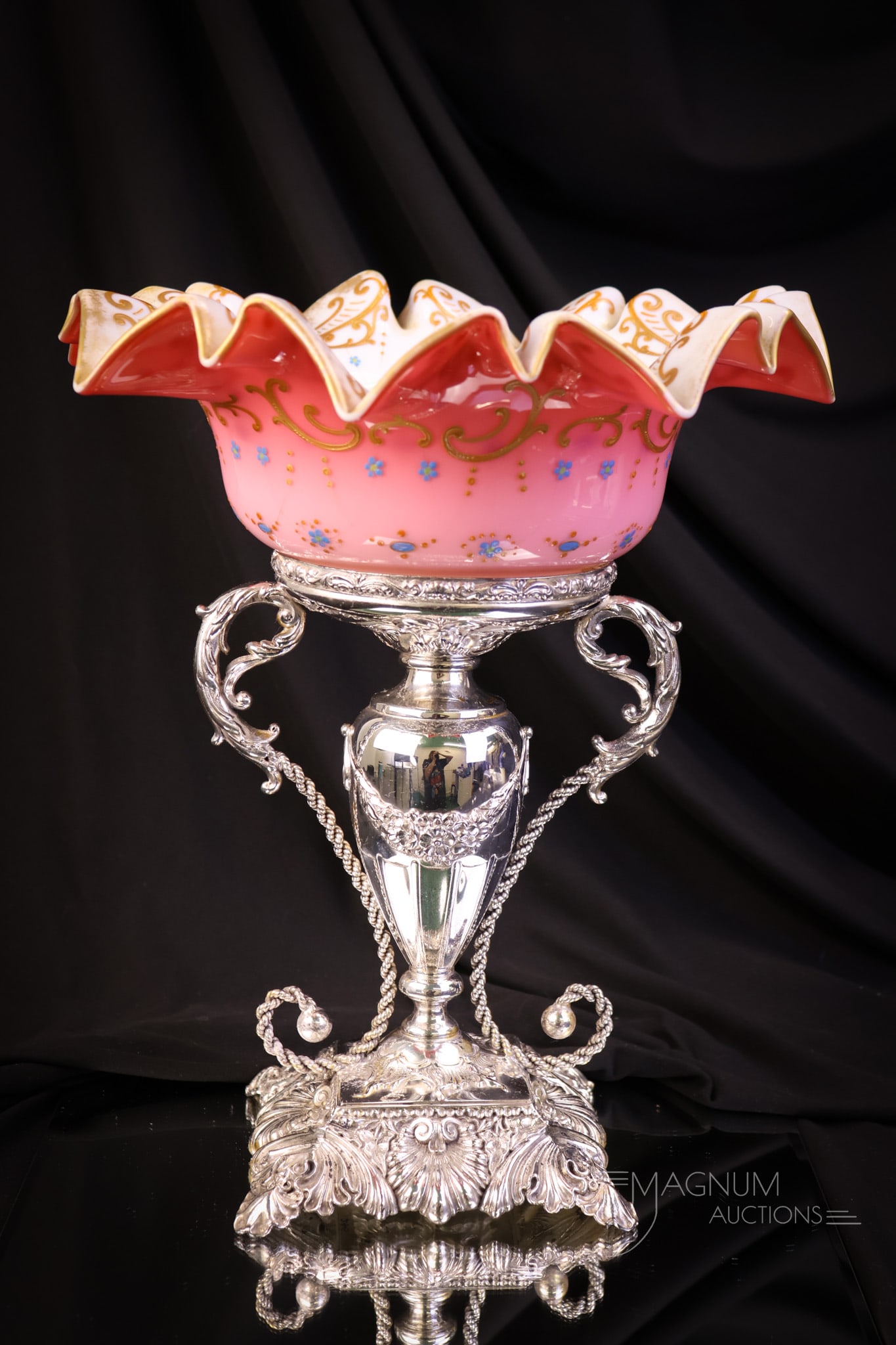 Southington Silverplate Victorian Enameled Uranium Glass Brides Bowl Centerpiece: A beautiful find in a pedestal Victorian bride's bowl centerpiece. This one is marked Southington silverplate and holds a pink cased and enamel decorated uranium-rich bowl. The complete piece measures