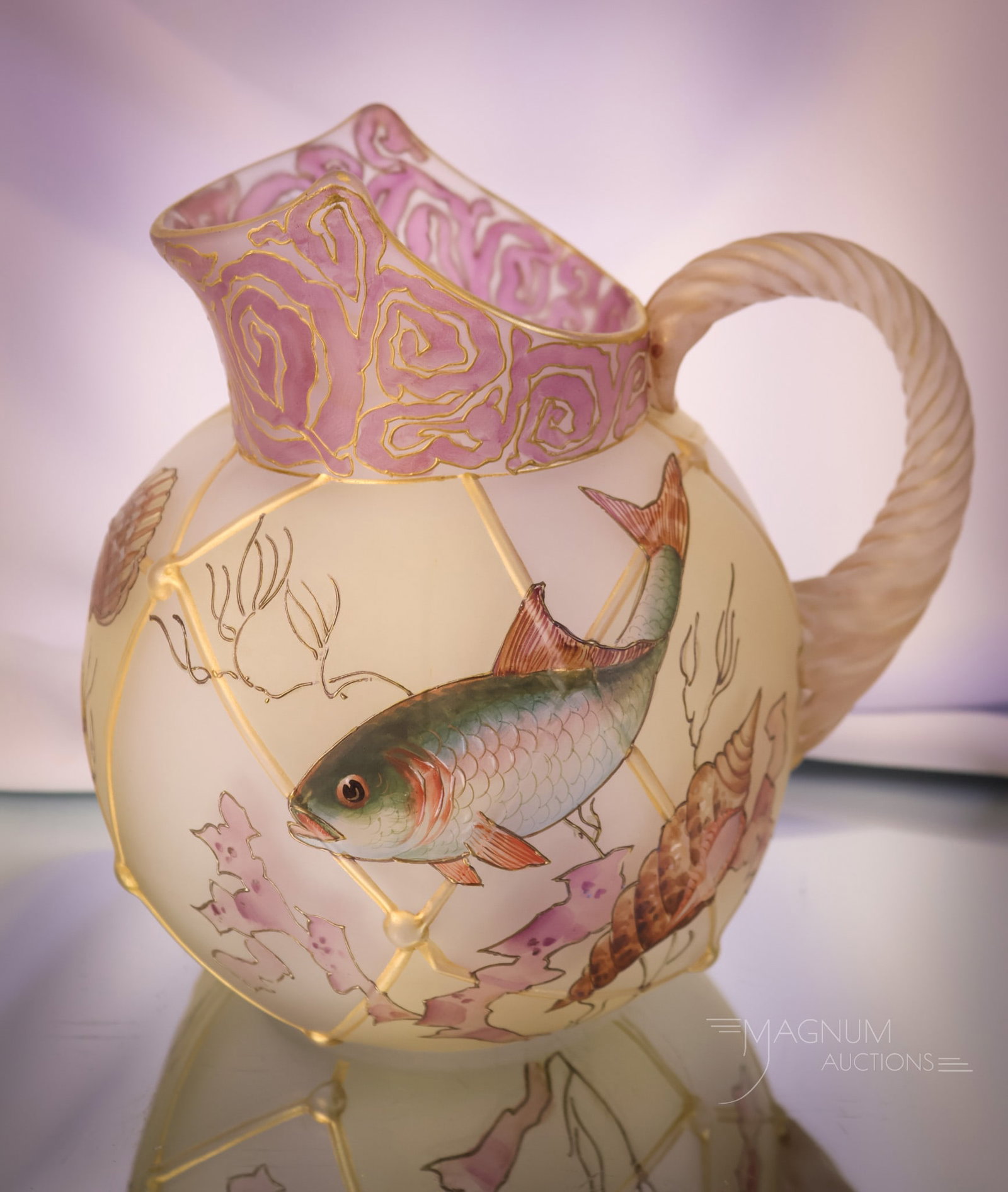 A Rare Mt. Washington Victorian Royal Flemish Fish Pitcher: A rare find in our auction of rarities. This is a Mt.Washington Royal Flemish glass pitcher. This pitcher is decorated with an "under-the-sea" motif of fish and seashells. The pitcher has gorgeous col