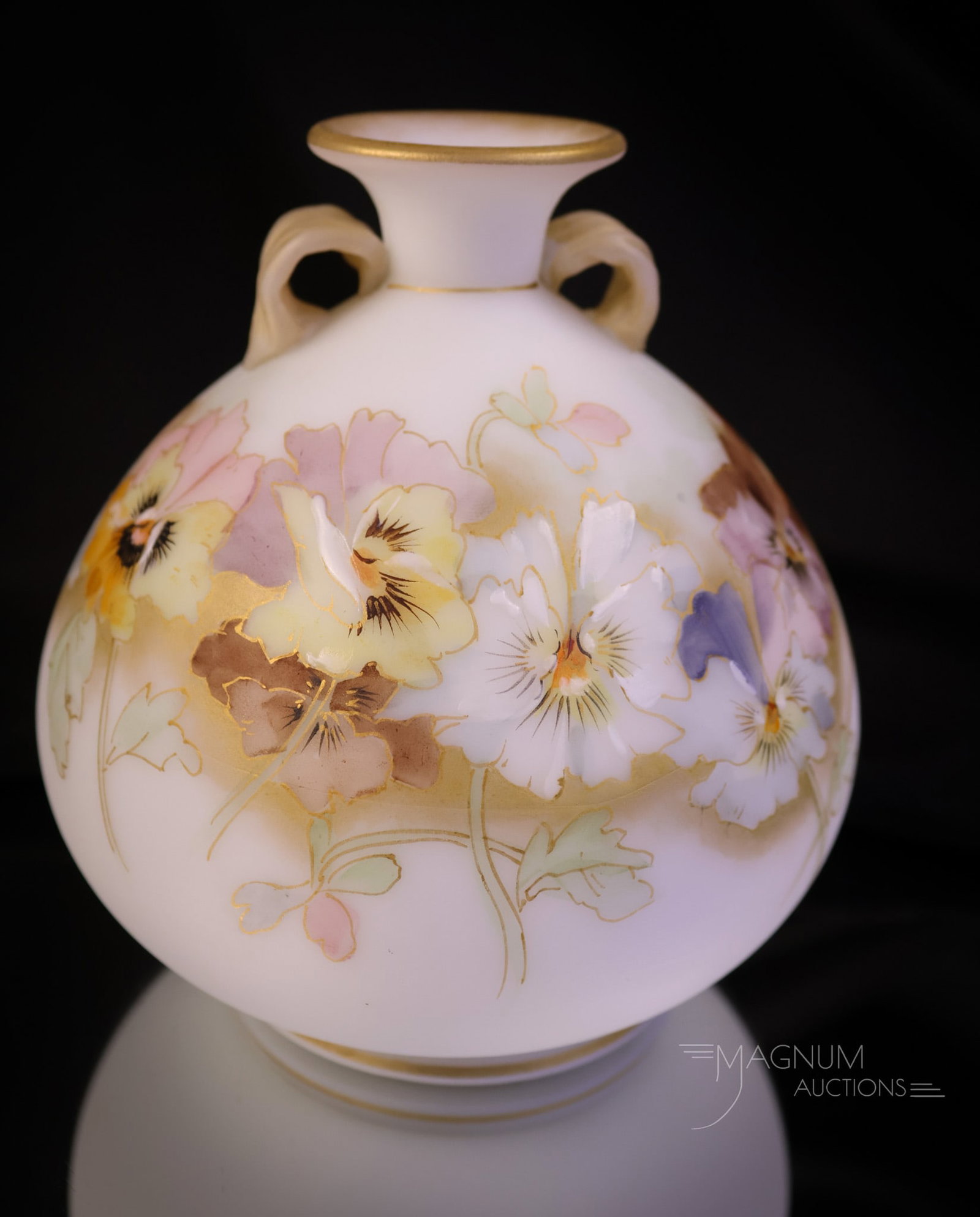 Mt. Washington Victorian Glass Pansy Decorated Vase: A charming find in a piece of Mt. washington art glass. This vase measures 4 3/4" tall and 4" wide. It features double tiny handles and a decoration of pansy flowers. SHIPPING NOTICE: If you choose no