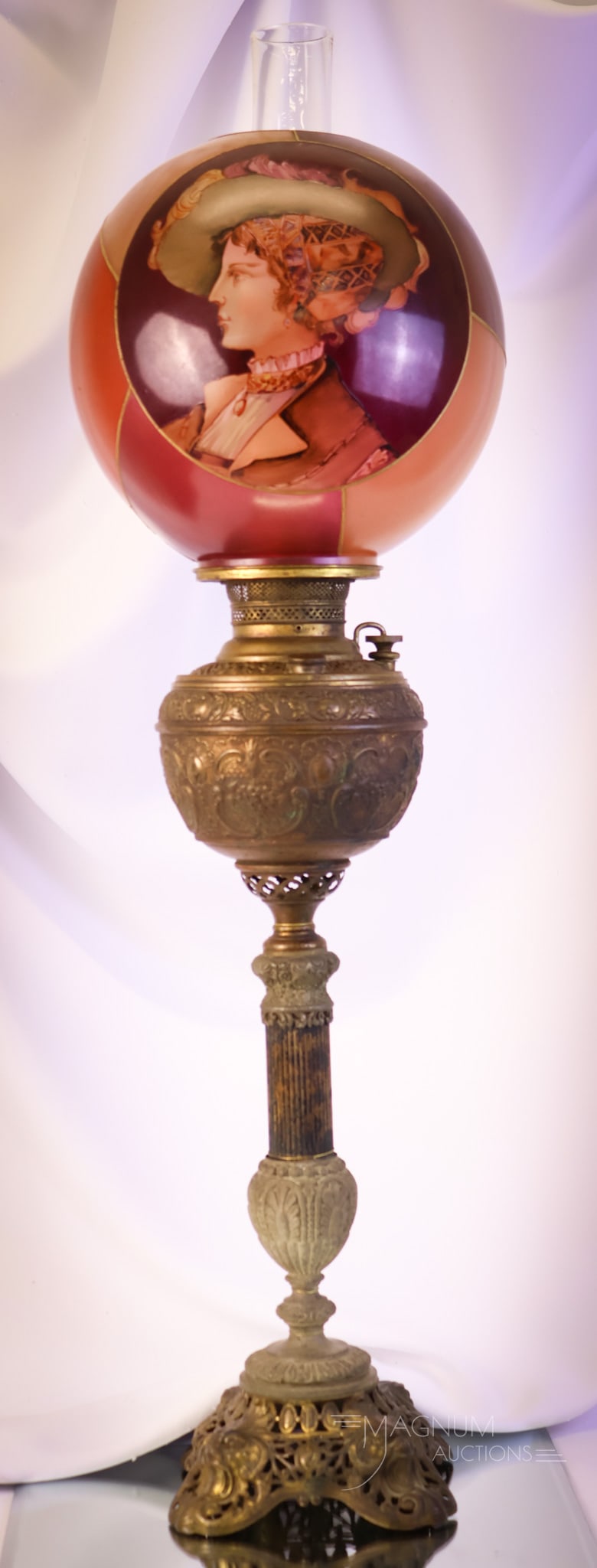 Exceedingly Rare Mt. Washington Royal Flemish Portrait Banquet Lamp: An exceedingly rare find in our auction. This is a Mt. Washington Portrait Royal Flemish Shade Banquet lamp. This shade is beautifully decorated with a portrait of a Victorian woman with a feathered h