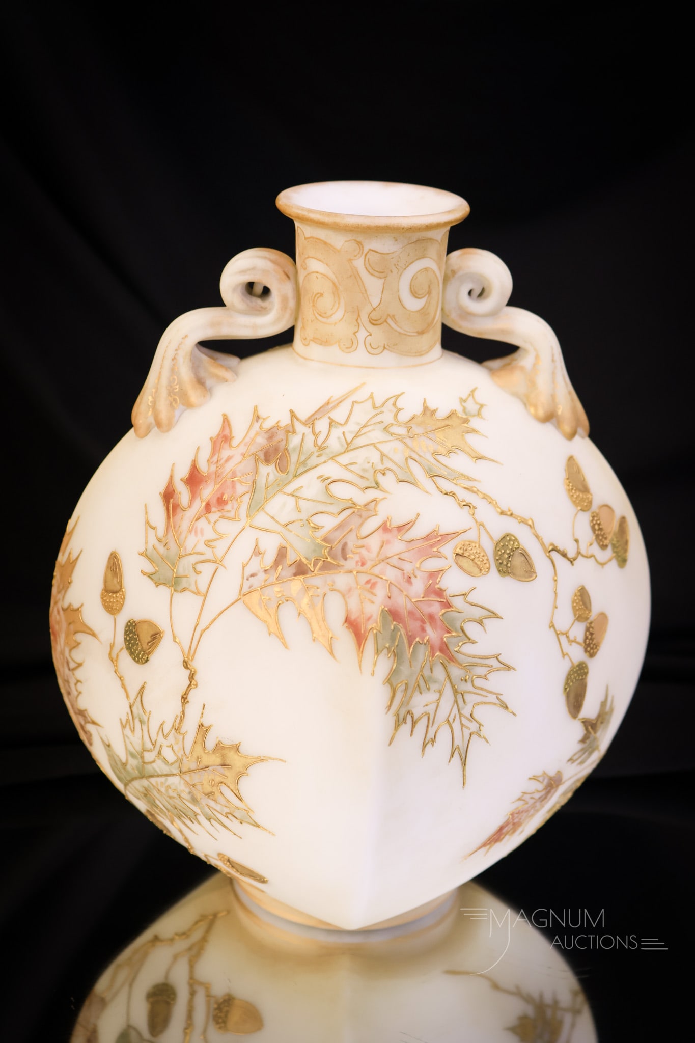 Mt. Washington Crown Milano Victorian Art Glass Vase: A classic form and decoration for Mt. Washington art glass. This vase measures 8 1/4" tall and 6 1/2" wide. This is in the Crown Milano line. It is decorated with oak leaves and acorn decoration. SHIP