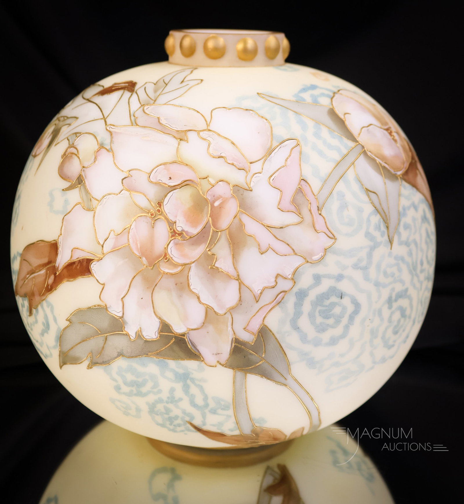 Mt. Washington Glass Crown Milano Victorian Vase: A nice find in Mt. Washington Crown Milano glass. This piece is richly decorated with blue designs on a cream ground and an abundance of florals. The piece measures 7" tall and 6 1/2" wide. SHIPPING