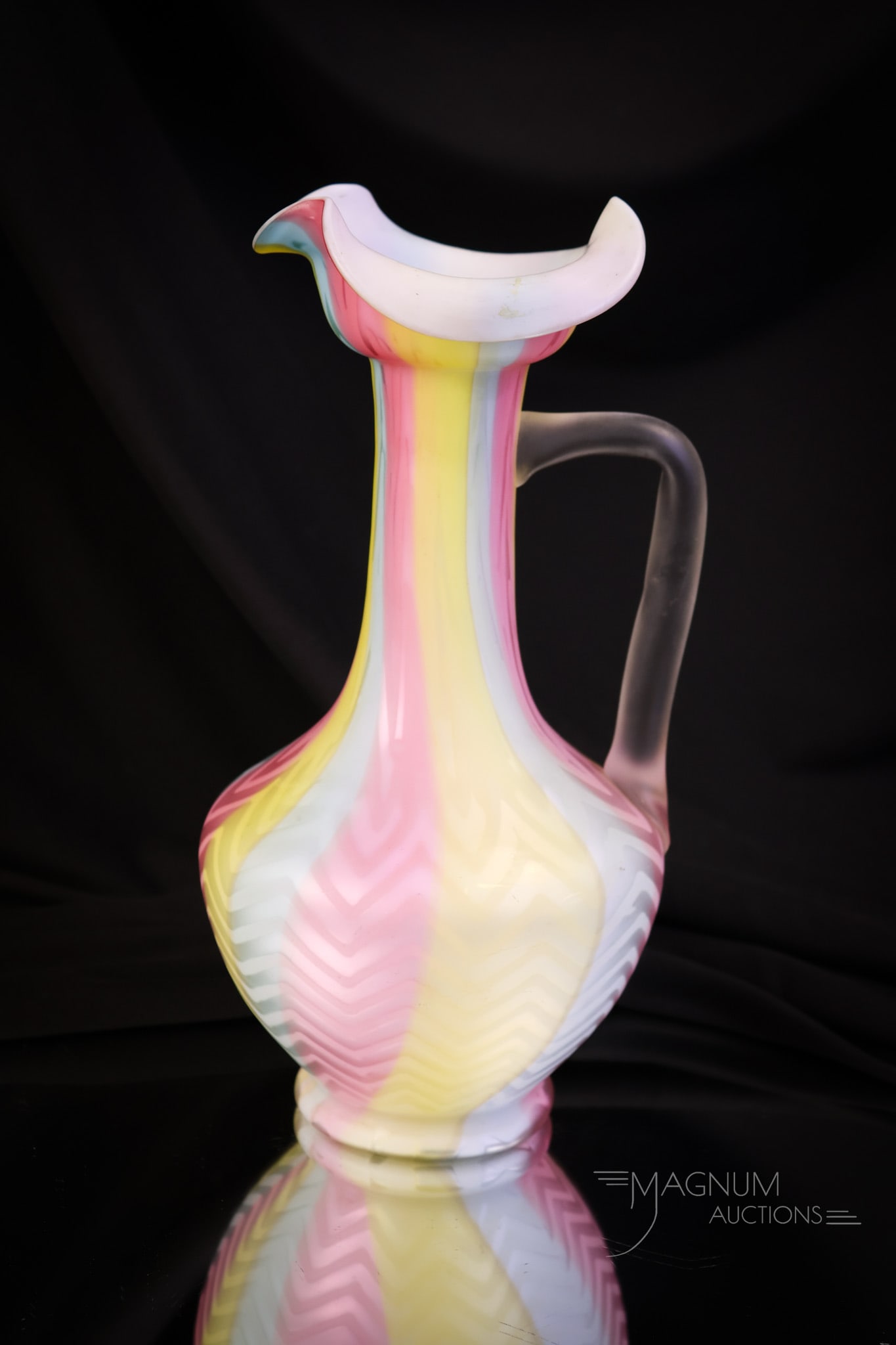 Rainbow Victorian Mother of Pearl Satin Glass Herringbone Ewer: A beautiful example of a Victorian rainbow mother of pearl, satin glass ewer. This piece is in the Herringbone pattern with exceptional coloring. The ewer measures 10" tall. SHIPPING NOTICE: If you ch