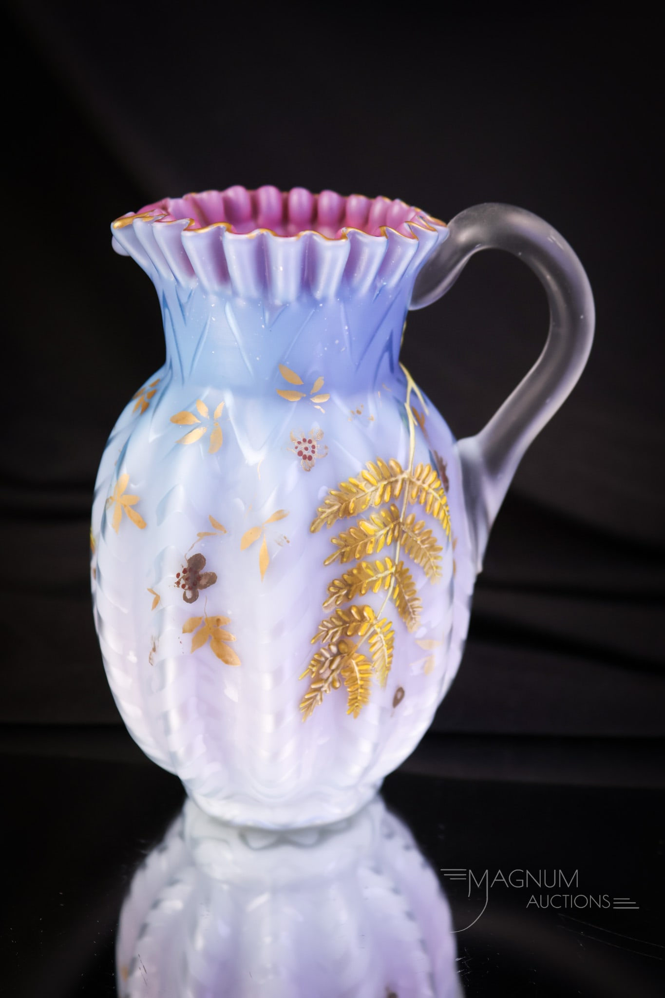 Blue Raspberry Victorian Gilt Mother of Pearl satin Glass Creamer: Another special piece in our auction of rare finds. This is a cream pitcher in blue-to-raspberry coloring. This fine piece is gilt decorated with a fern frond decoration. The creamer is a delphinium b