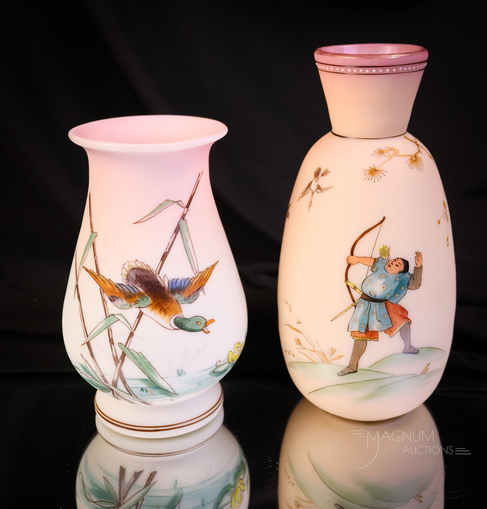2 pc Lot Bohemian Victorian Enamel Decorated Uranium Glass Cabinet Vases: Two desirable finds in Victorian burmese glass cabinet vases. Each is rich in uranium content and glow brightly under black light. The first vase features a duck decoration. The second features an arc