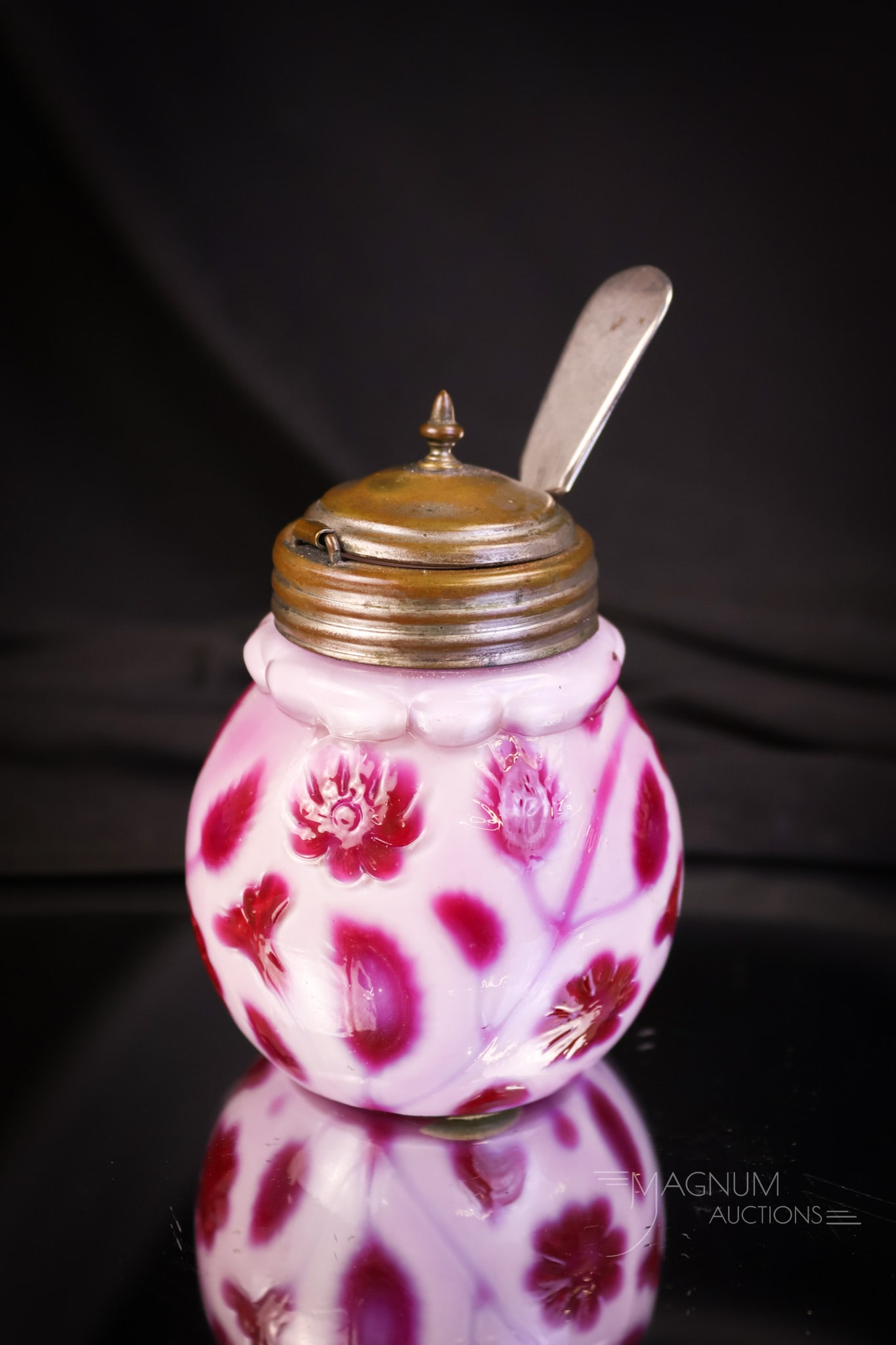 Museum Rarity Raspberry Victorian Findlay Onyx Glass Mustard Jar: A superb example of a Raspberry colored Victorian Findlay onyx mustard jar. This piece has super coloring. The mustard retains the original lid and has a mustard spoon. The jar measures 3 1/4" tall. S
