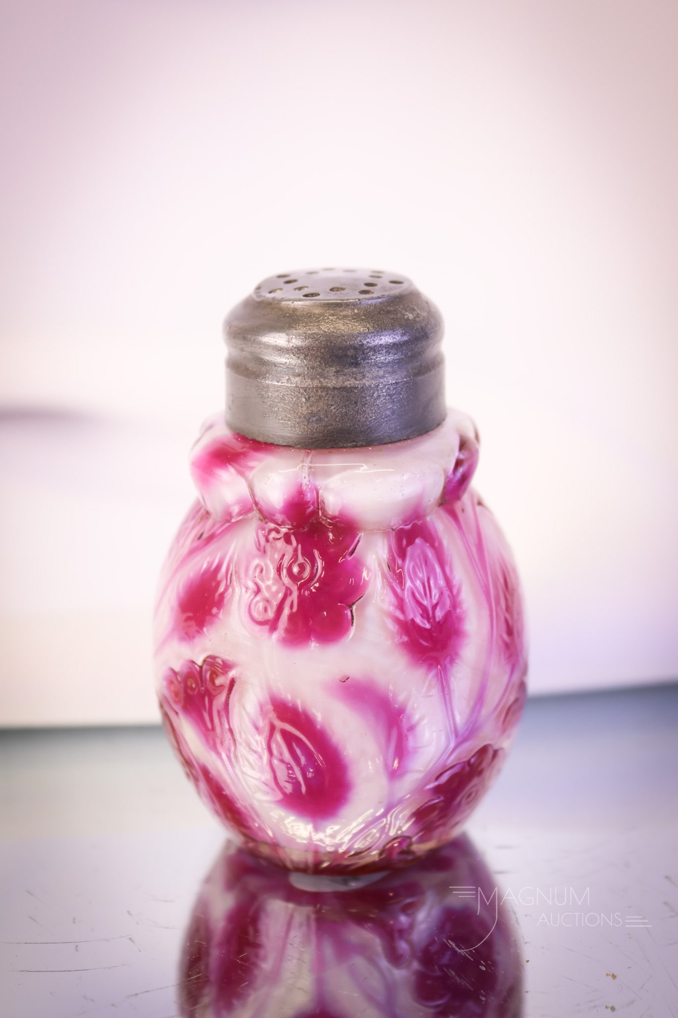 Museum Rartity Raspberry Findlay Onyx Glass Victorian Salt Shaker: An incredible rarity in Victorian Findlay Onyx glass. This is a raspberry colored findlay onyx salt shaker. This piece has absolutely incredible coloring. The shaker measures 2 3/4" tall and 2" wide. 