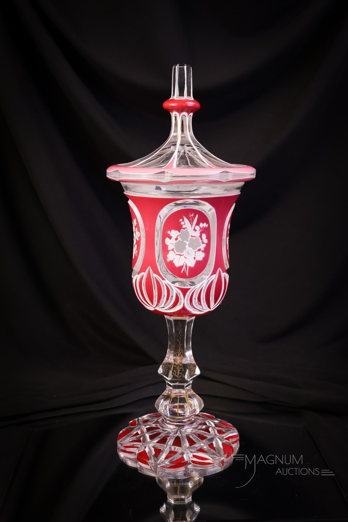 Victorian 15" Bohemian Pink Cut Overlay Gilt Decorated Glass Pokal Chalice: A striking find in Victorian Bohemian glass. This is a pokal or chalice. It is in pink cut to white to clear overlay glass. This piece has a matching lid and is accented by gilt decoration. The piece 