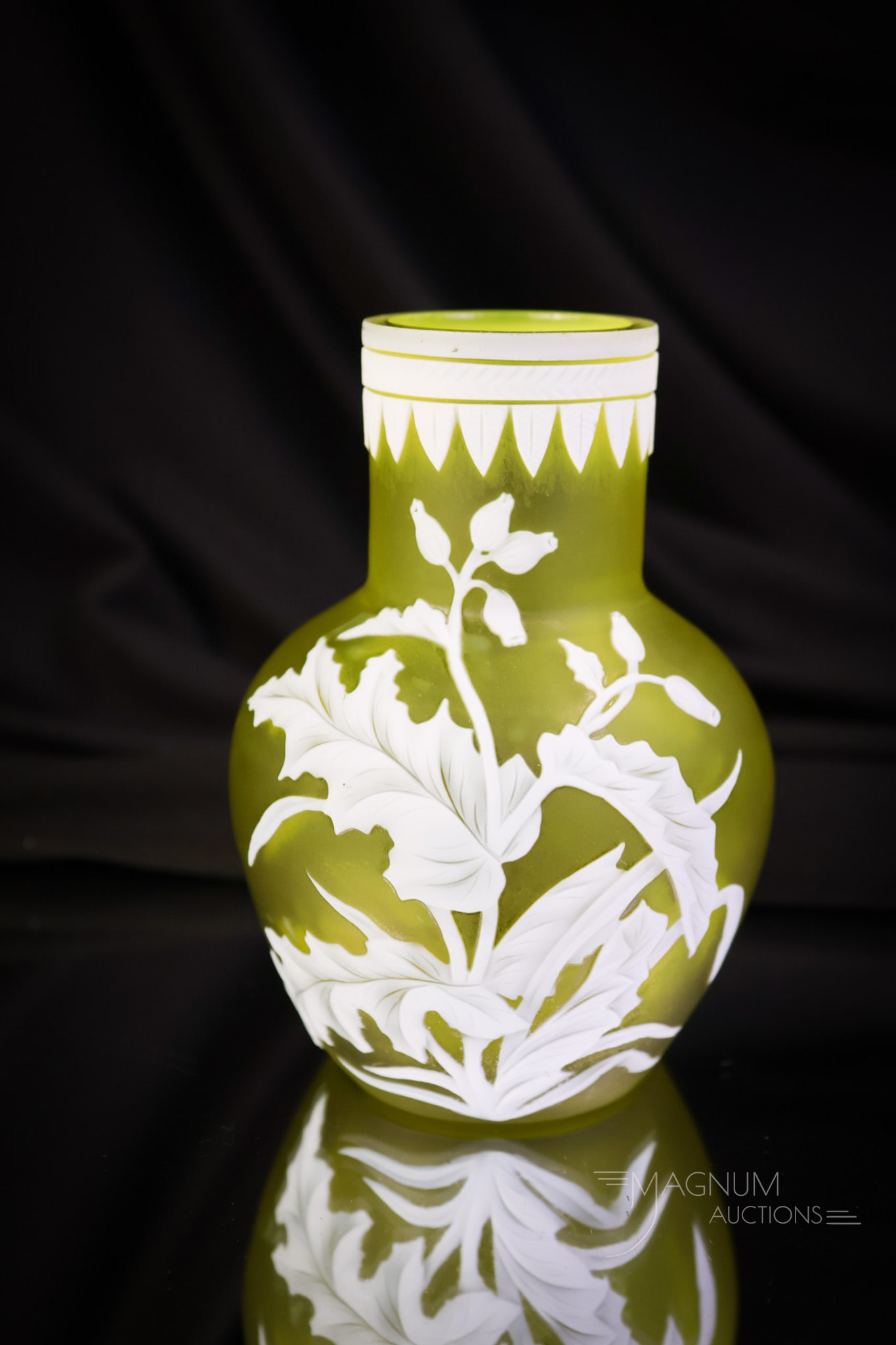 Citron Victorian English Cameo Art Glass Cabinet Vase: A wonderful piece attributed to Webb. This English cameo art glass cabinet vase measures 4 1/4" tall. The vase has a rim cut with acanthus leaves and flowering plants on the front. The color of the va