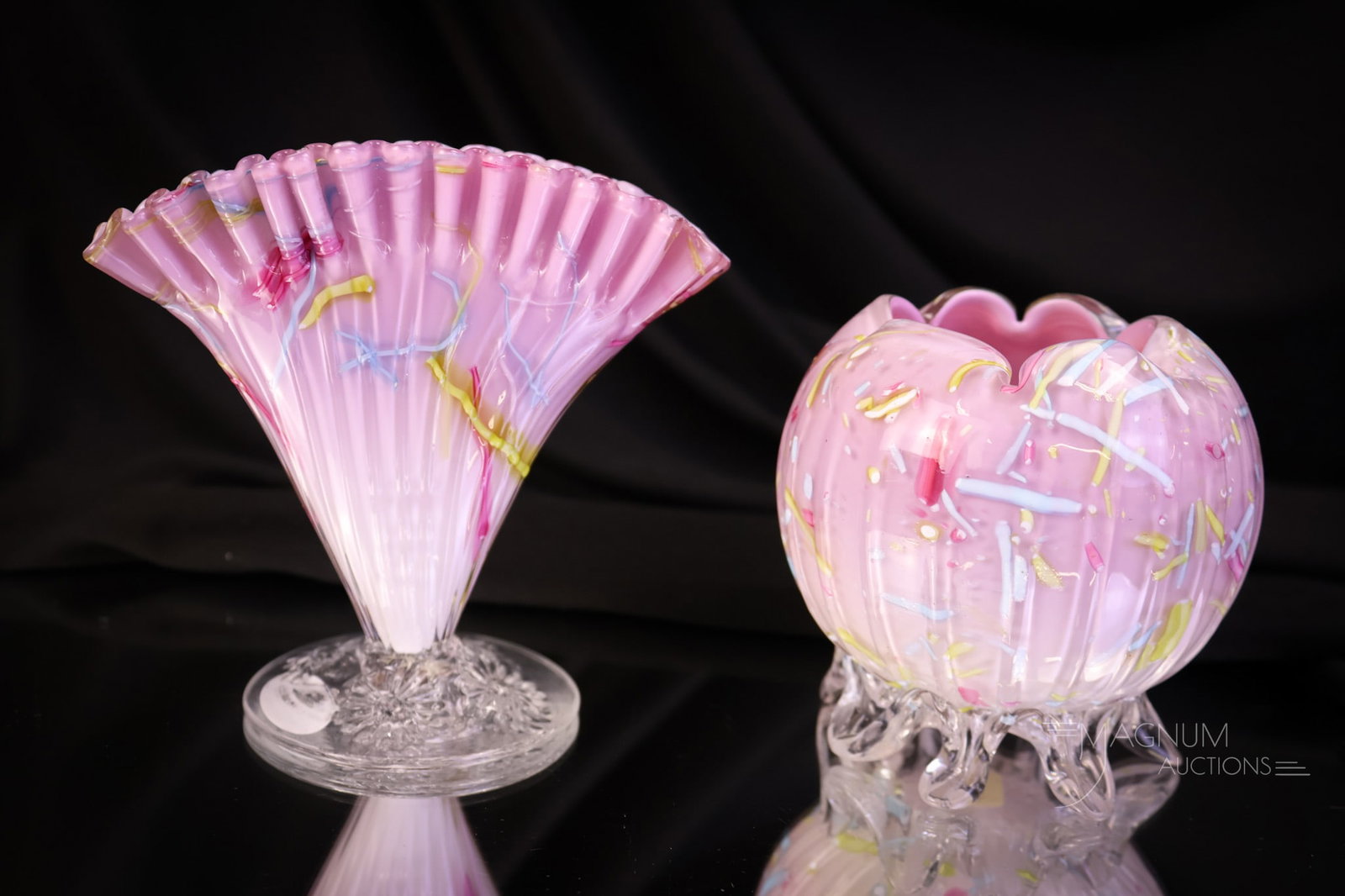 2 pc Lot Mauve Cased Victorian Rainbow Peloton Art Glass Miniature Rose Bowl & More: Two delights in mauve-cased rainbow-threaded peloton glass. Can't make up your mind? You won't have to. Both pieces are offered in this lot. You get a miniature rose bowl with applied glass feet for t