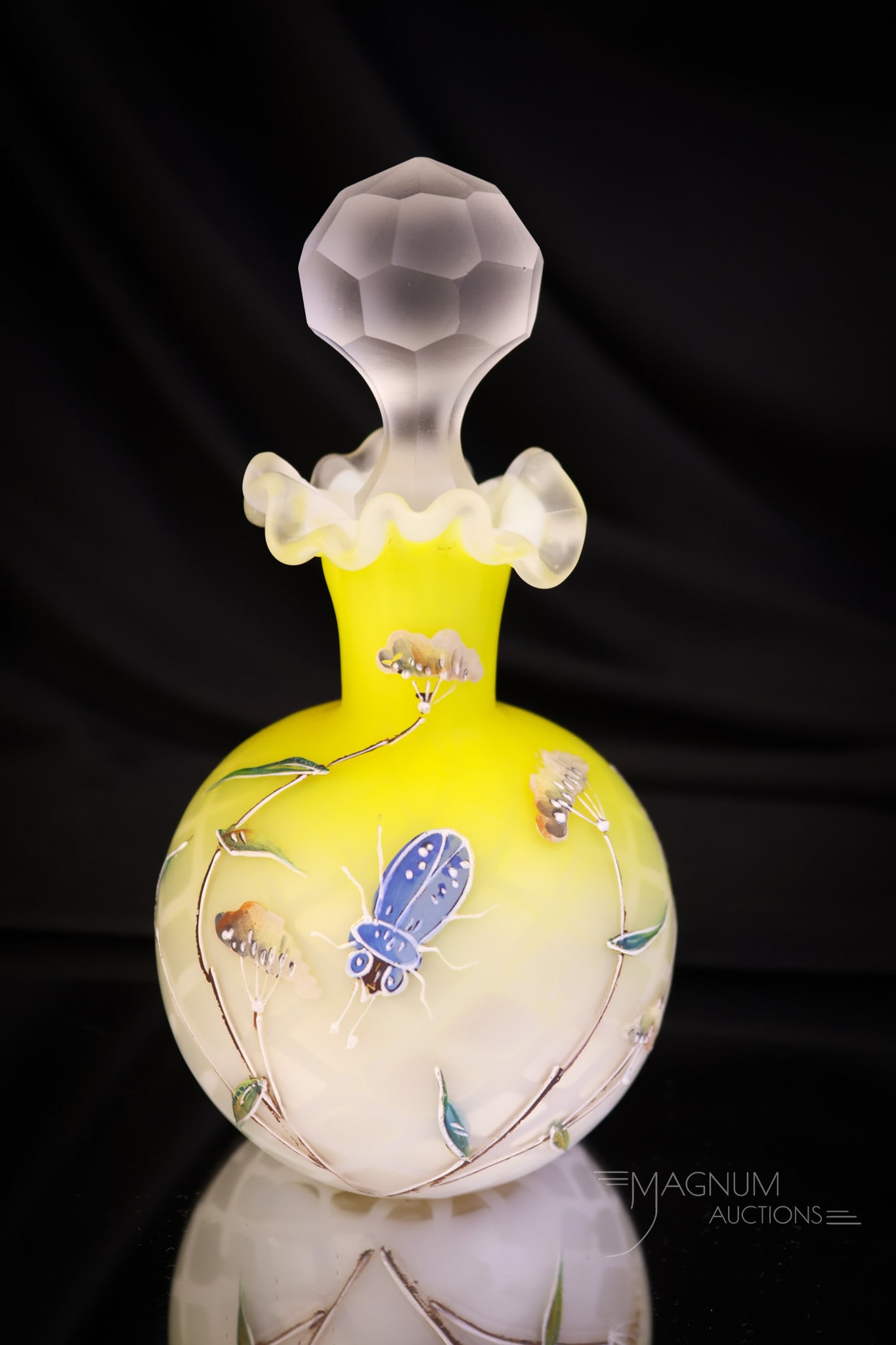 Victorian Beetle Mother of Pearl Satin Glass Decorated Perfume Bottle: A scarce find in a Victorian enameled glass perfume bottle. This one is in Canary yellow, decorated with flowers and a beetle. The pattern of the glass is a diamond quilt. The perfume measures 5 1/4" 