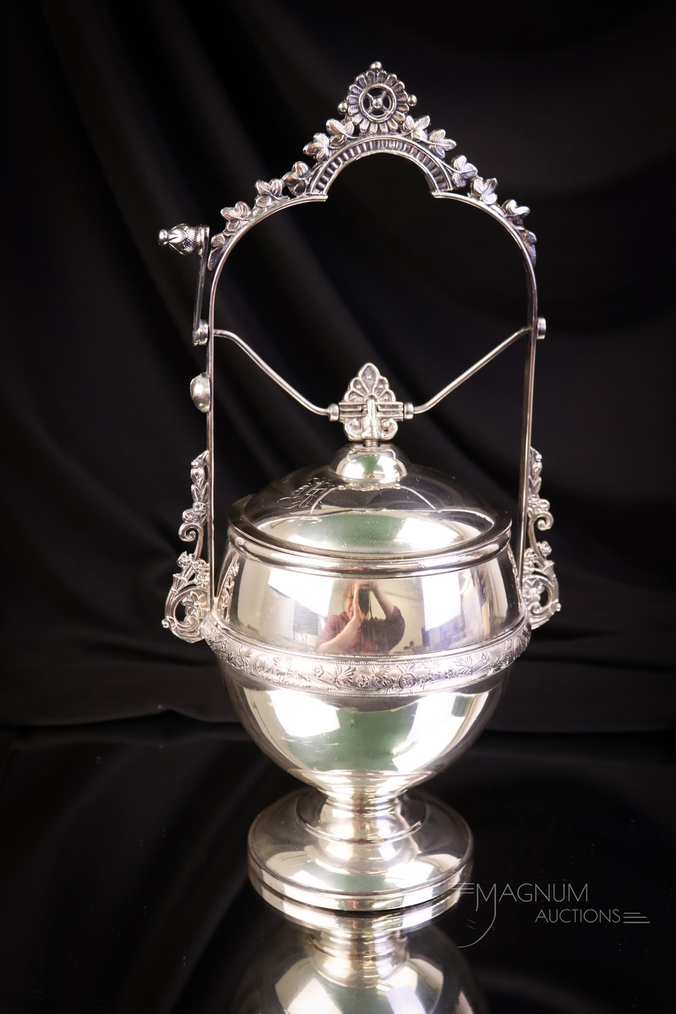 Webster Victorian Silverplate Mechanical Jewelry Casket: A nice sought-after piece of Victorian silverplate. This is a mechanical jewelry casket made by Webster. This piece features a maroon lining. The casket measures 12" tall and 5 3/4" wide. SHIPPING NOT