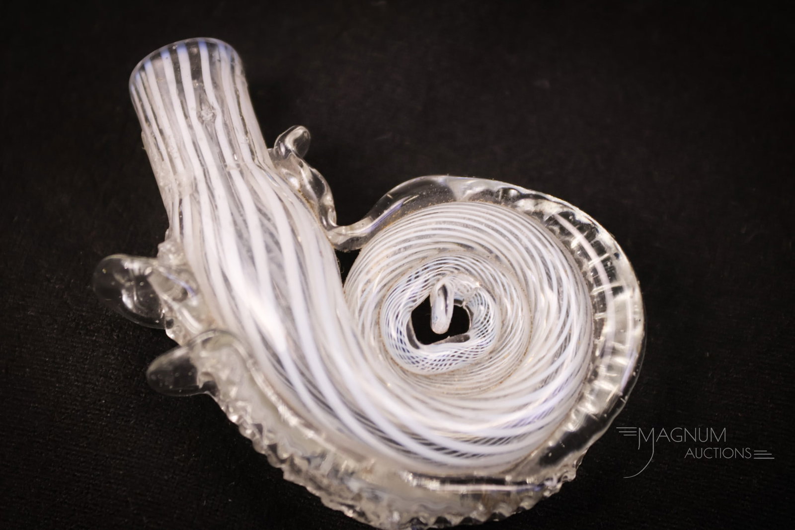 Colonial American Seahorse Perfume Bottle c.1760: A free-blown Colonial American Seahorse perfume scent bottle. This piece is circa 1760. It is attributed to Wistarberg or Stiegel. This piece is a latticino glass with clear rigaree. The piece measure