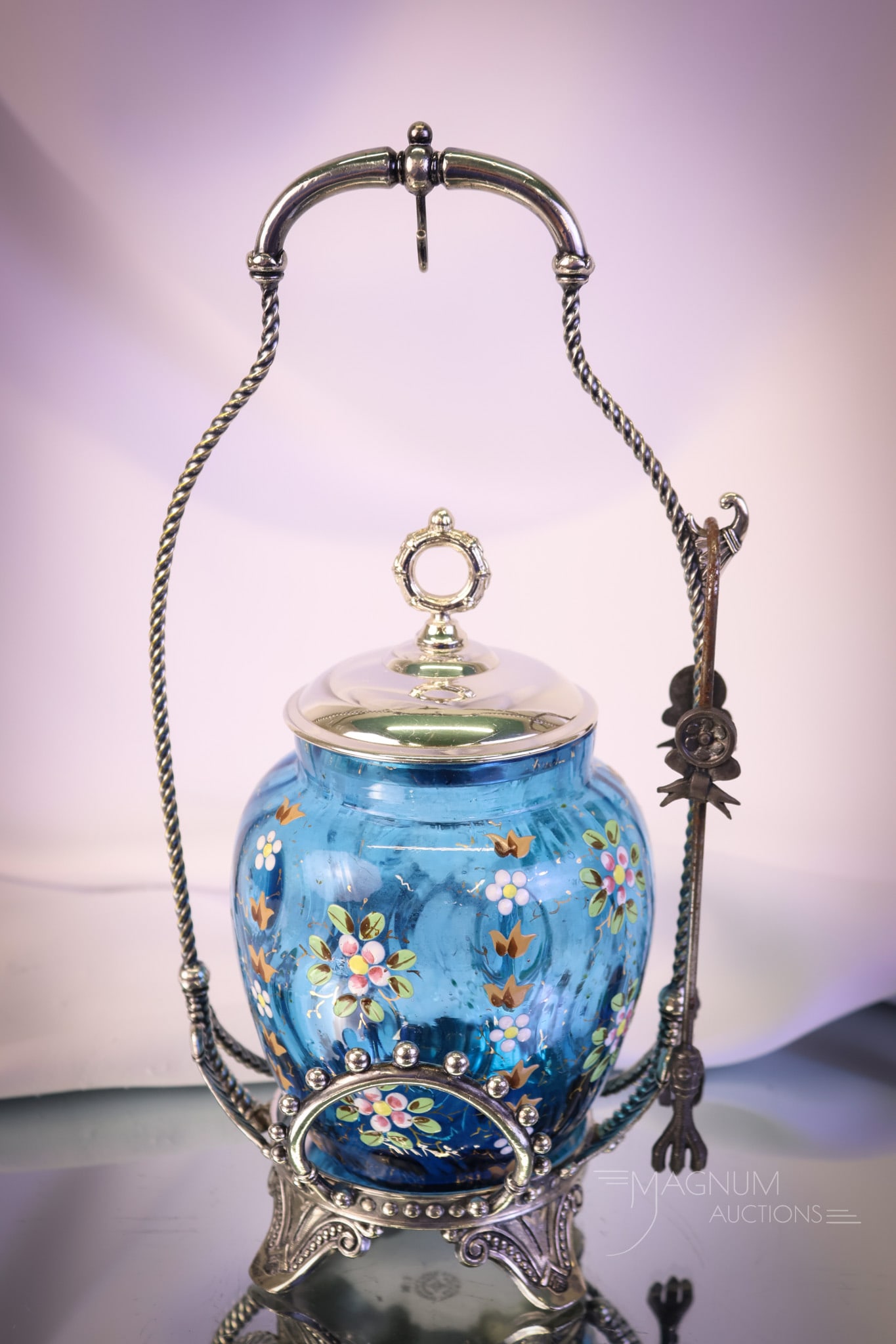 Tufts Silverplate Victorian Blue Enamel Decorated Pickle Castor: A beautiful find in a Victorian pickle castor. This one is marked, Tufts. It features a blue tree bark optic pickle jar. It is enamel and gilt decorated. The castor measures 10 1/2" tall and 5 3/4" wi
