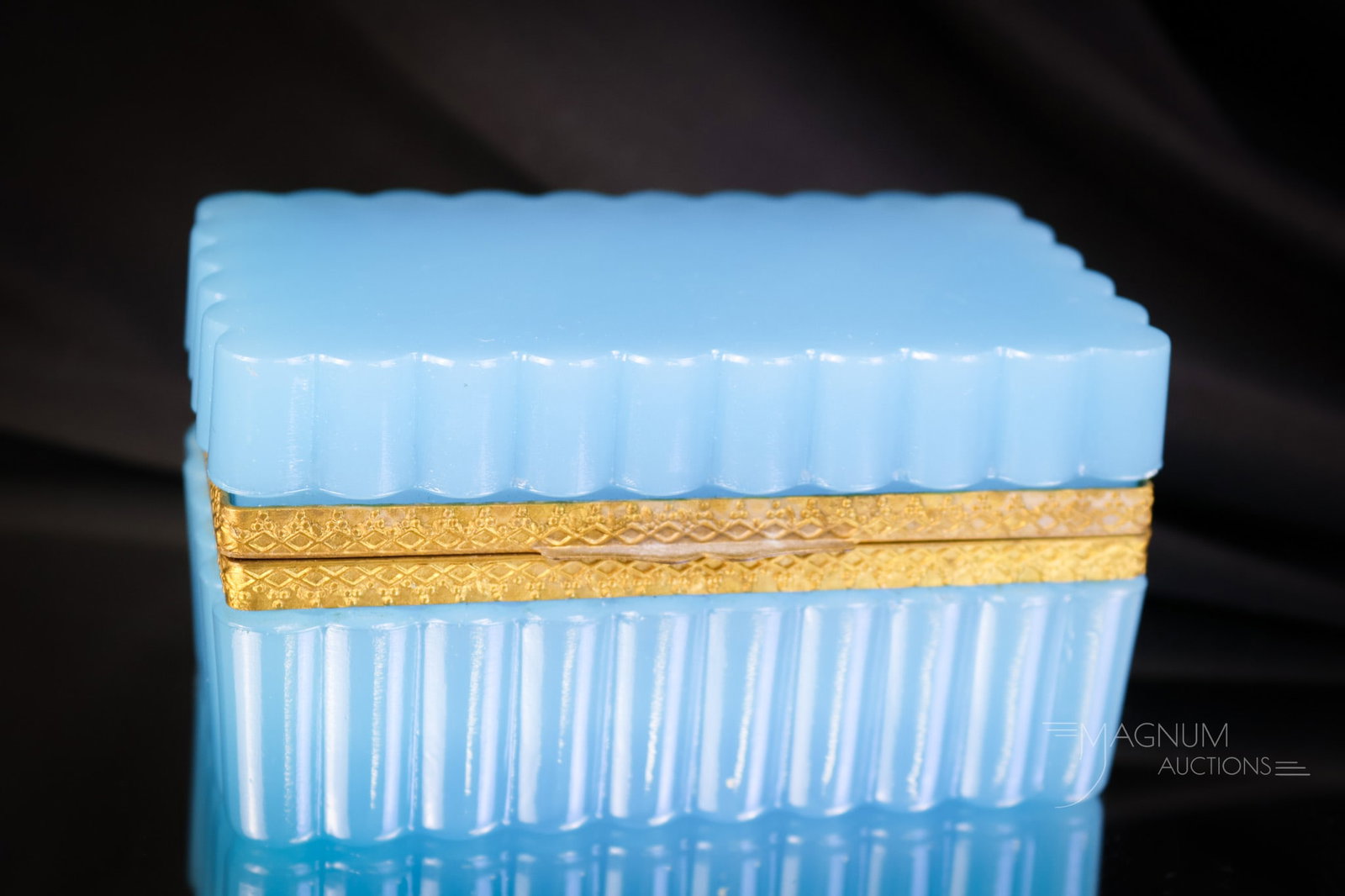 French Blue Opaline Pillar Glass Ormolu Jewelry Casket: A classic for your bidding pleasure. This is a French blue opaline glass jewelry casket in a pillar mold. It is rectangular in form and has ormolu mountings. The casket measures 2 1/4" tall and 4 1/2"