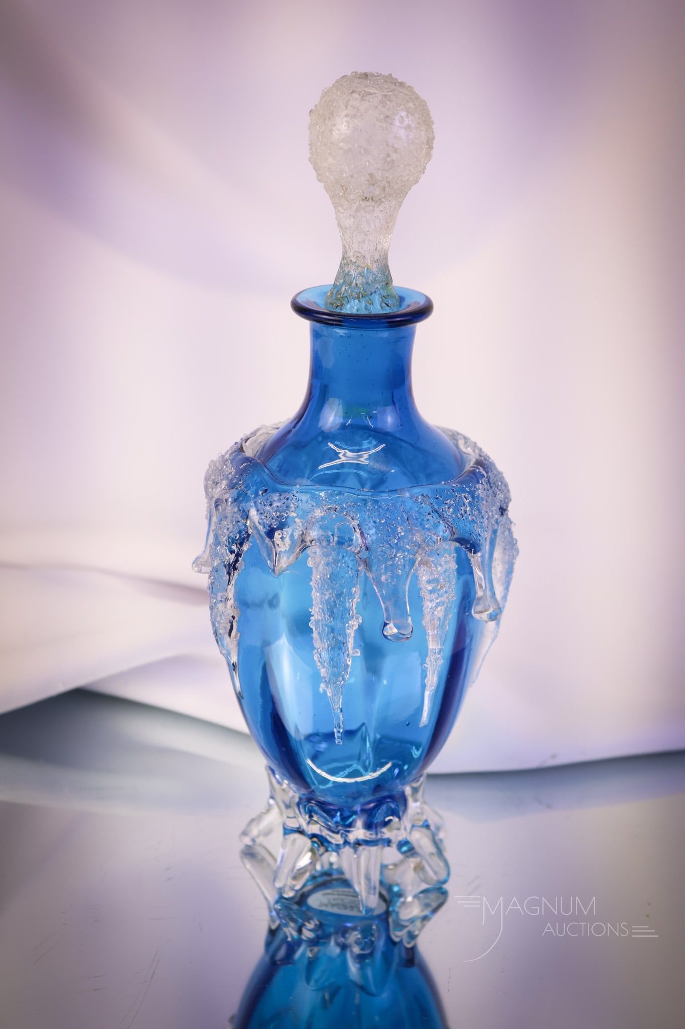 Bohemian Victorian Icicle Glass Prussian Blue Overshot Glass Cologne Perfume Bottle: A super find in a perfume or cologne bottle. This one is in Prussian blue with overshot icicles around the shoulder and a matching overshot glass stopper. The piece measures 9" tall and 3" wide. SHIPP