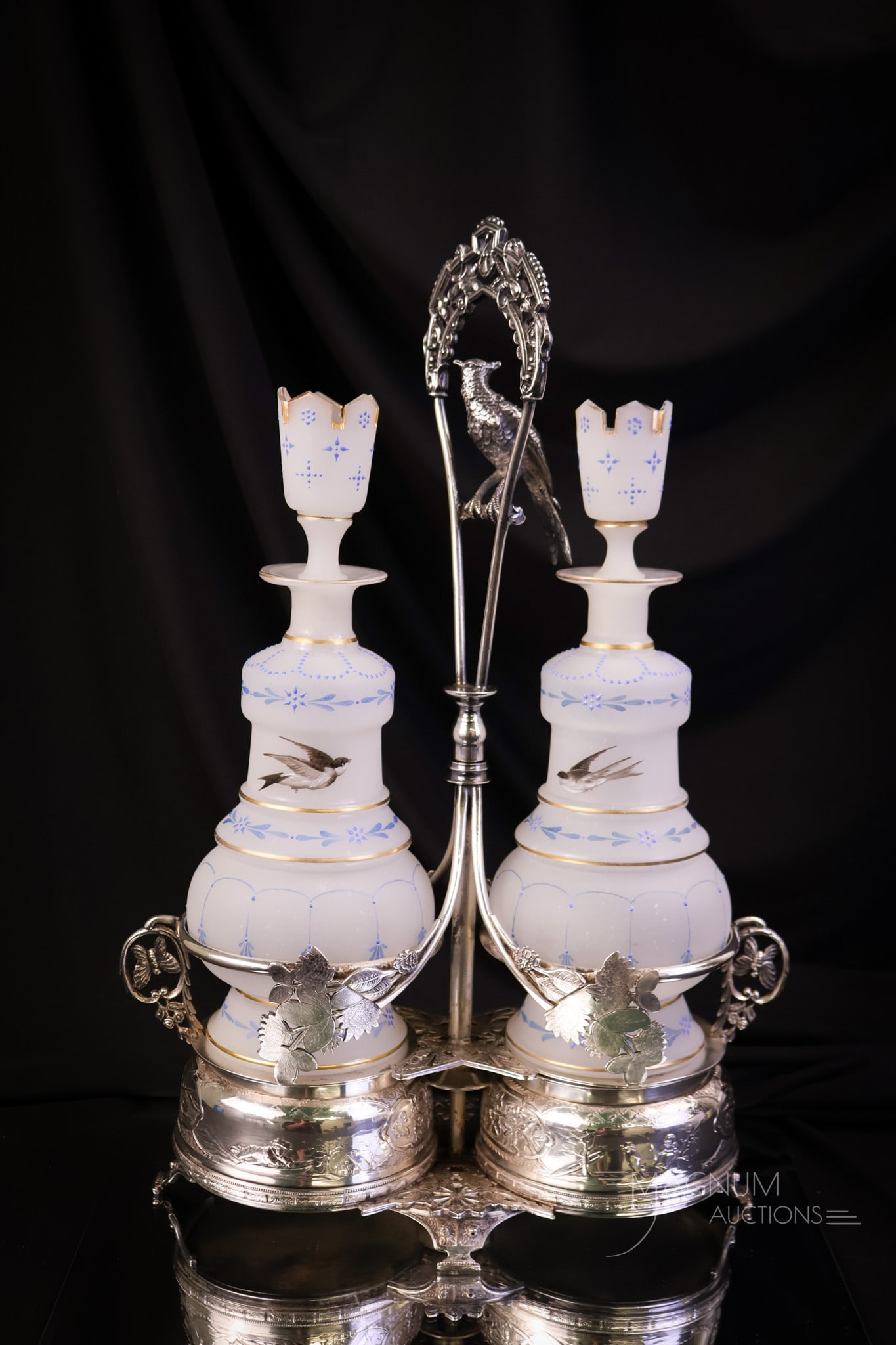 Museum Rarity Wilcox Silverplate 16" Mechanical Glass Cologne Jewelry Castor: A fine museum piece of Wilcox Victorian silverplate. This is a huge mechanical jewelry castor, complete with an opposing decorated pair of opaline glass cologne bottles. Each bottle features a bird in